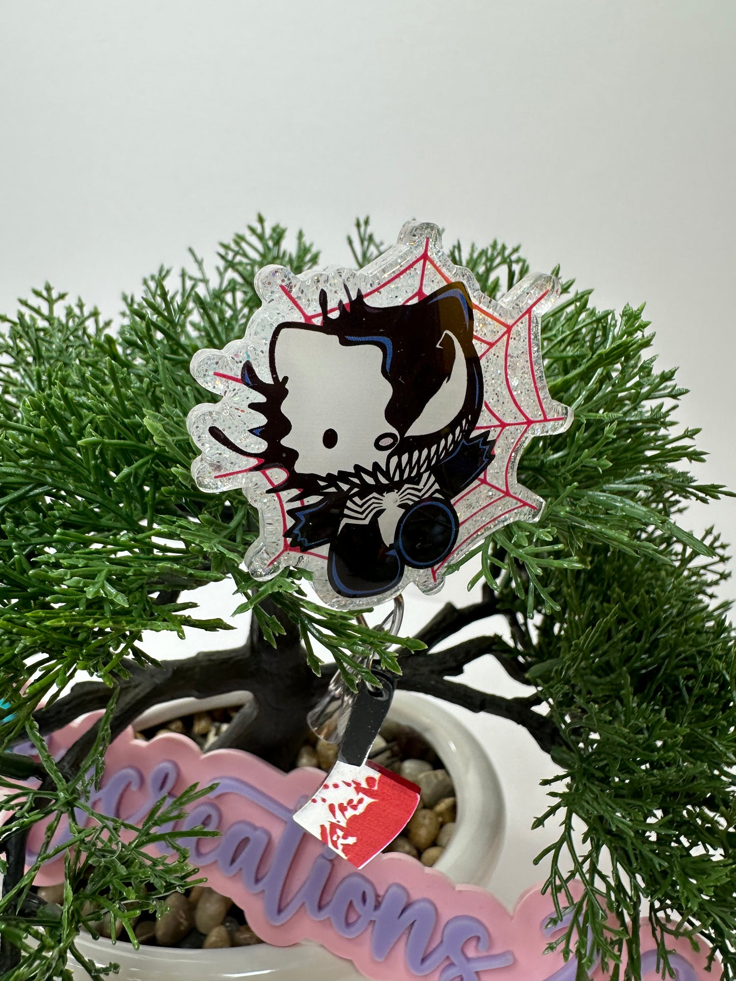 Kitty Venom Badge Reel