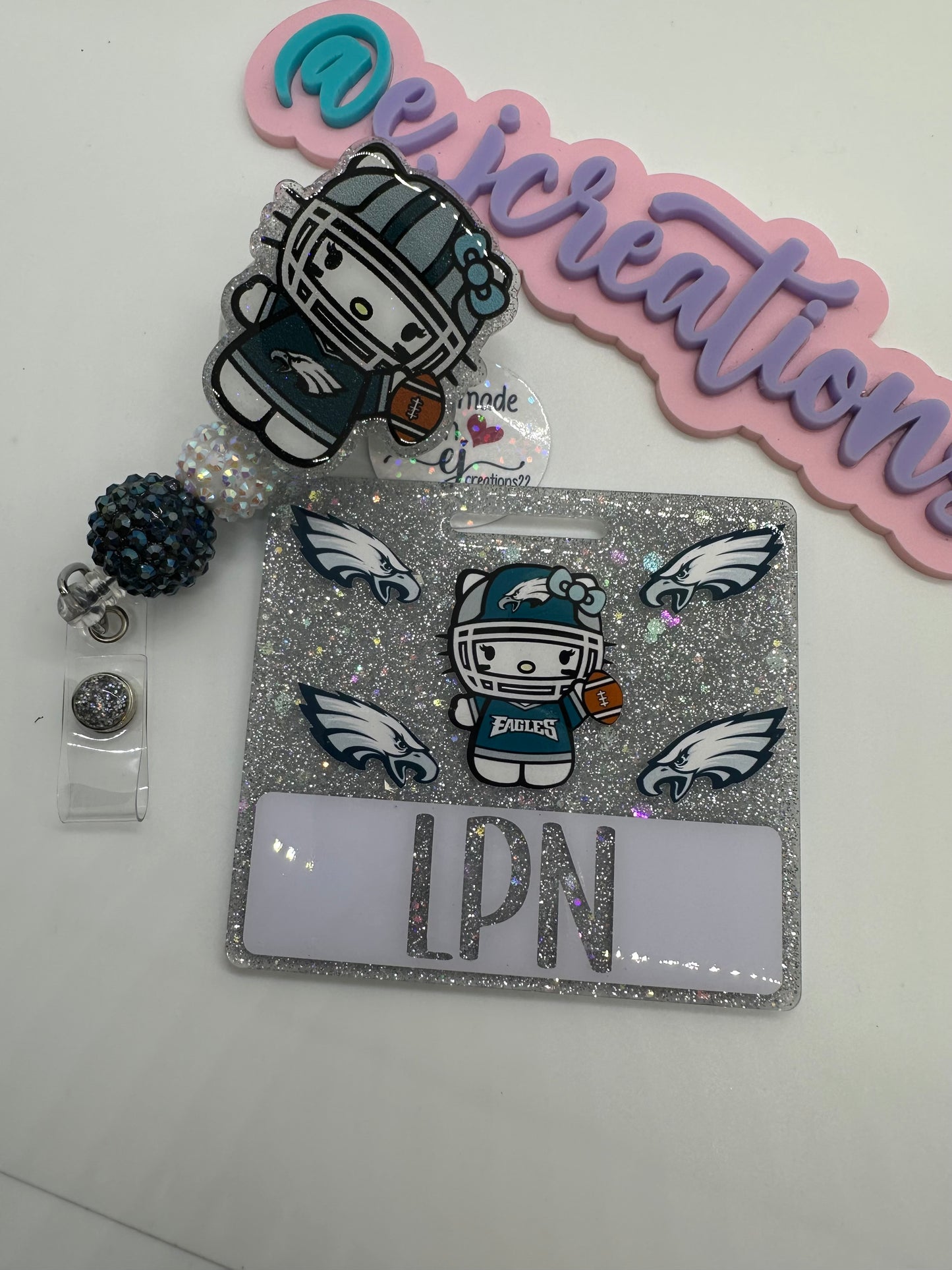 hello kitty eagles badge buddy set