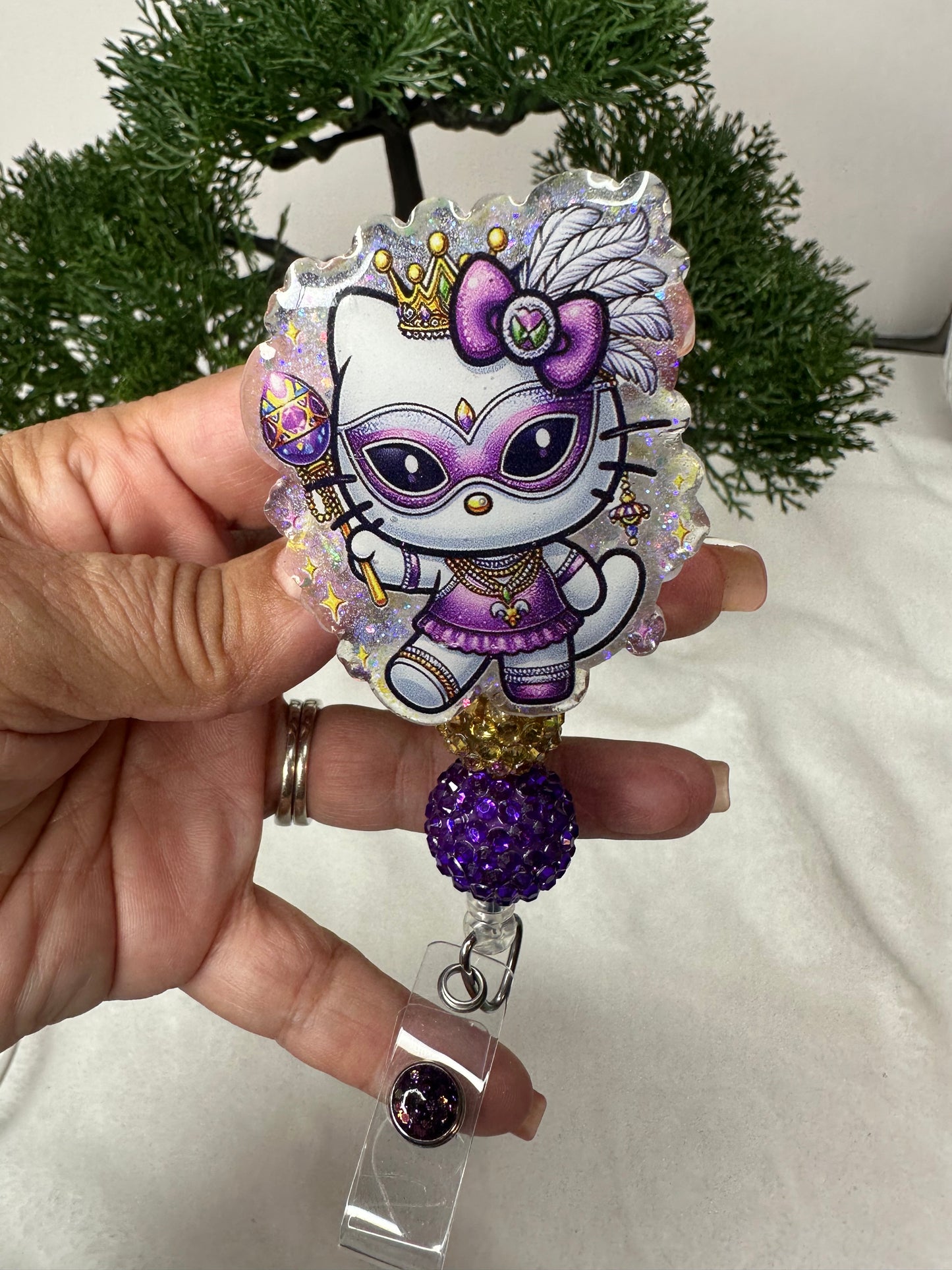 Kitty Mardi Gras Badge Reel