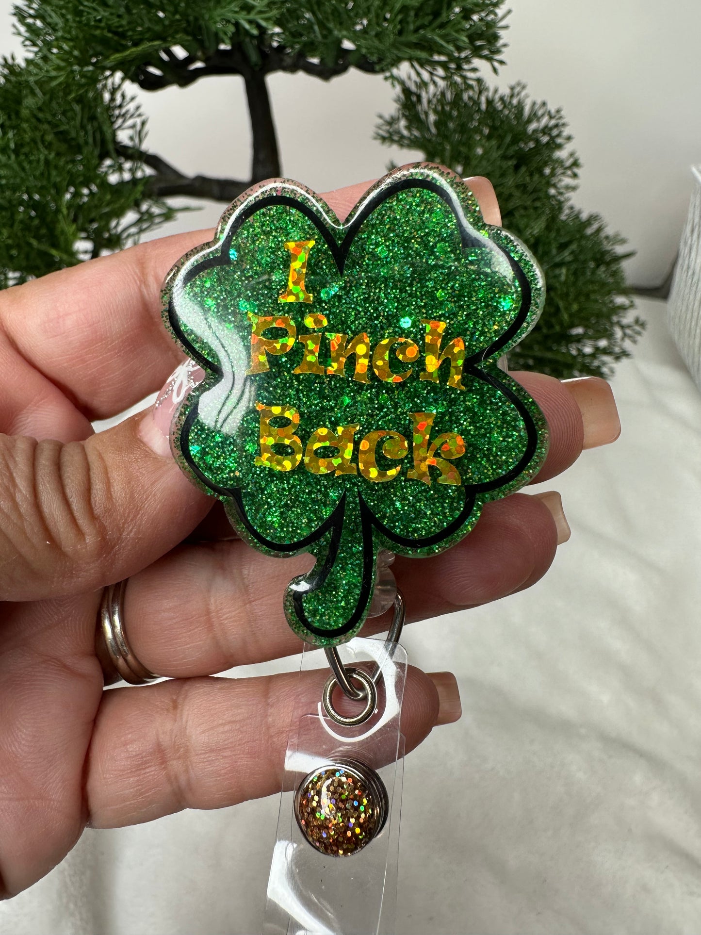 I Pinch Back Clover Badge Reel