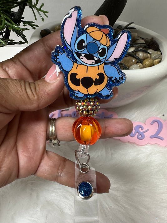 Pumpkin Blue Alien Badge Reel