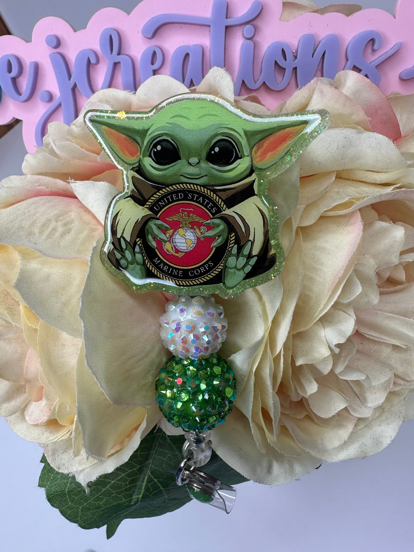 Baby Alien Marine Badge Reel