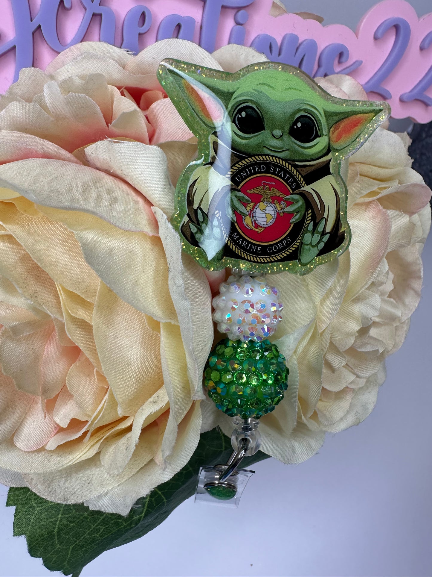 Baby Alien Marine Badge Reel