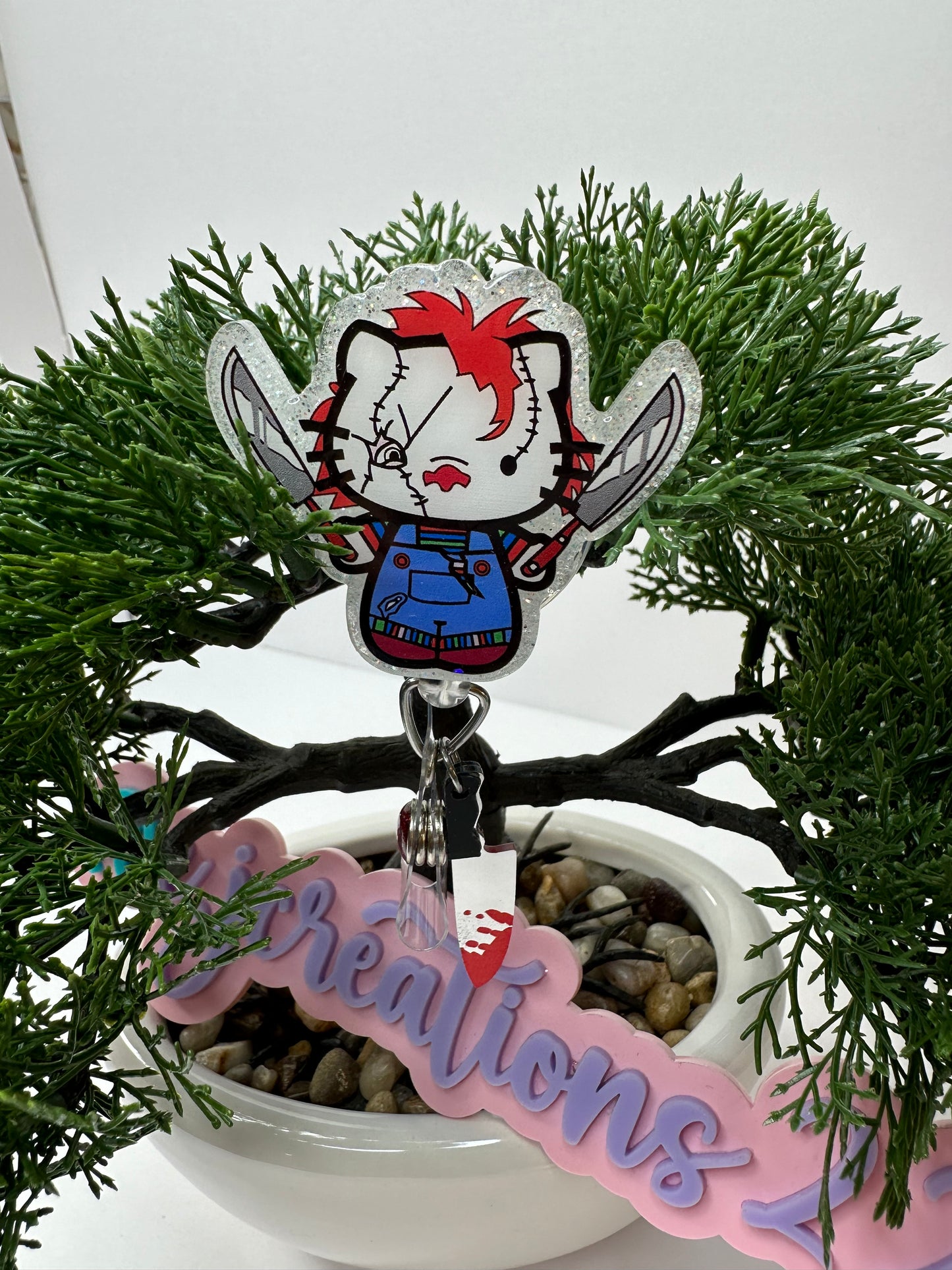 Kitty Chucky Badge Reel