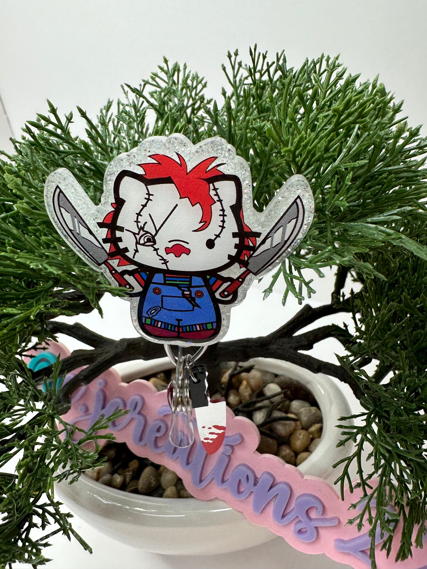 Kitty Chucky Badge Reel