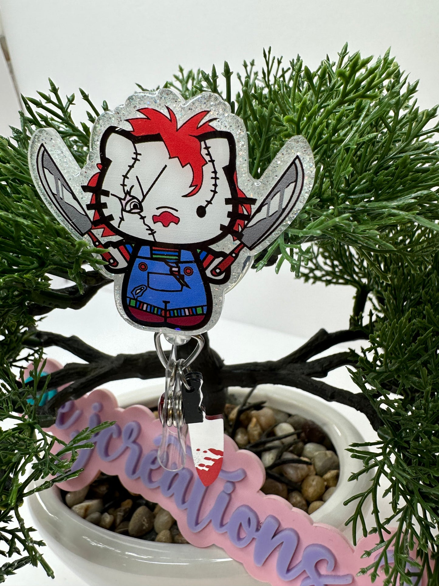 Kitty Chucky Badge Reel