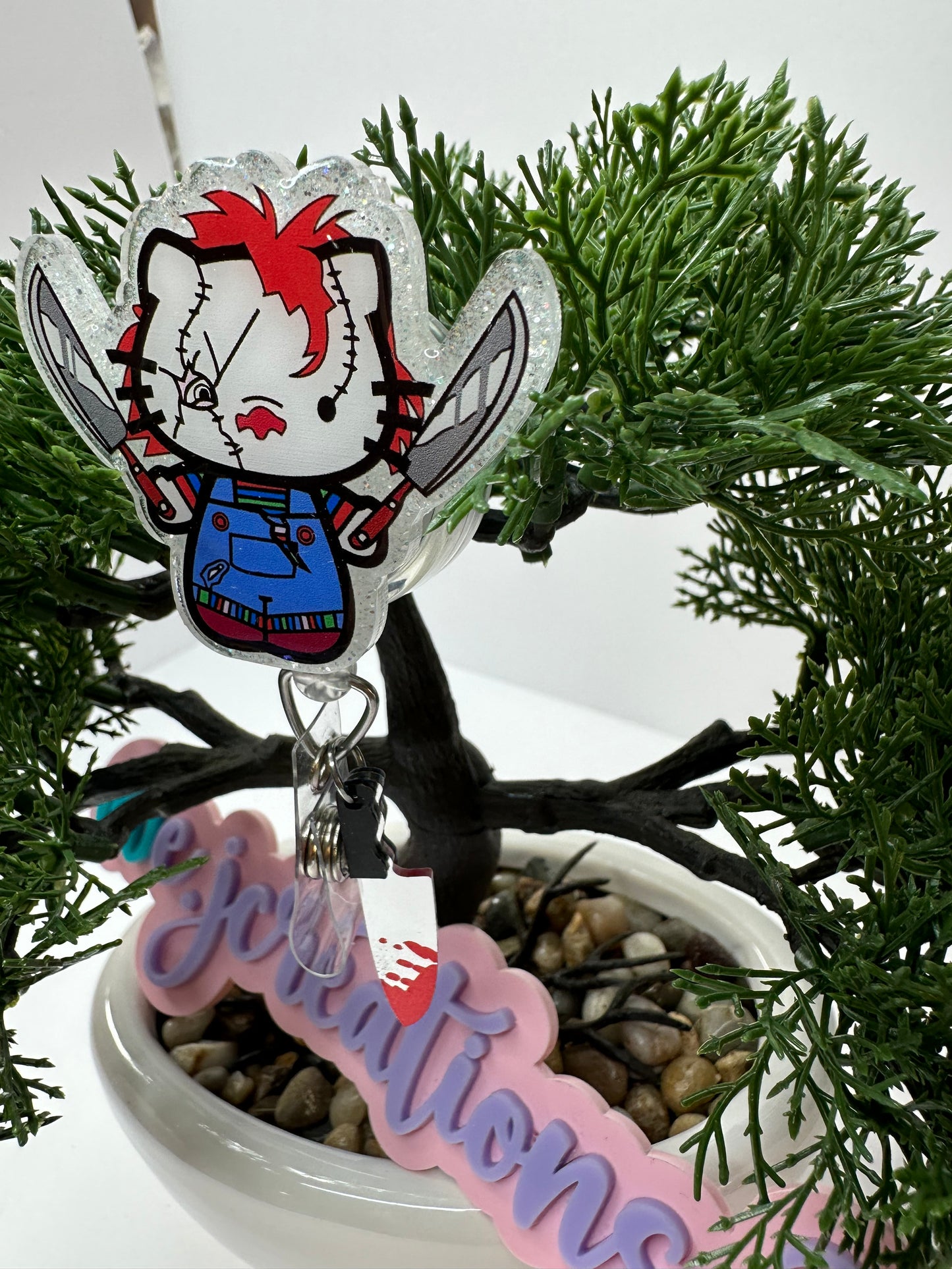 Kitty Chucky Badge Reel