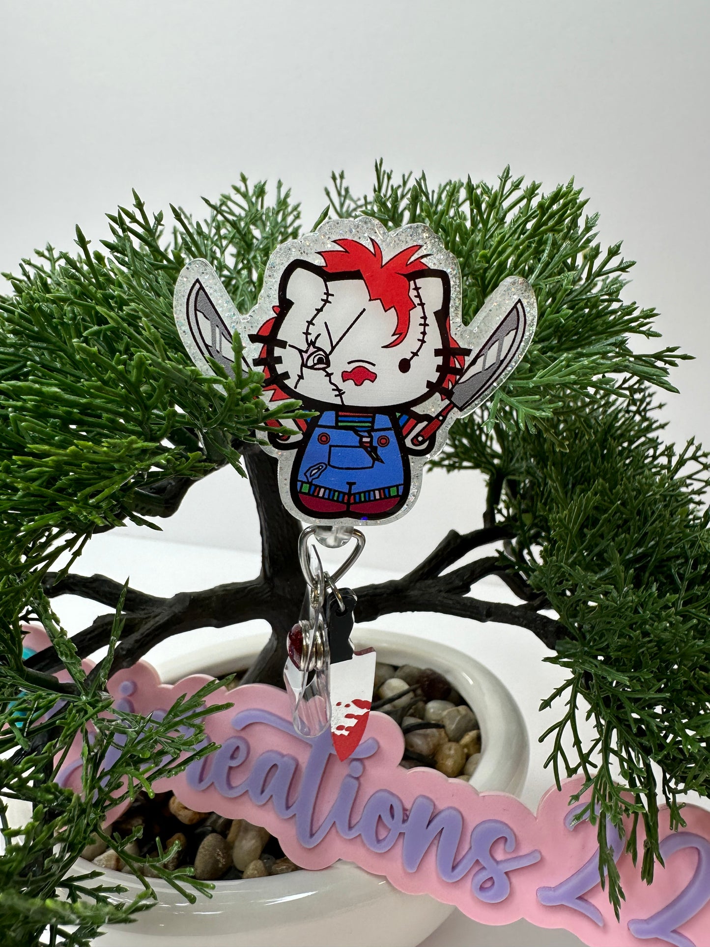 Kitty Chucky Badge Reel