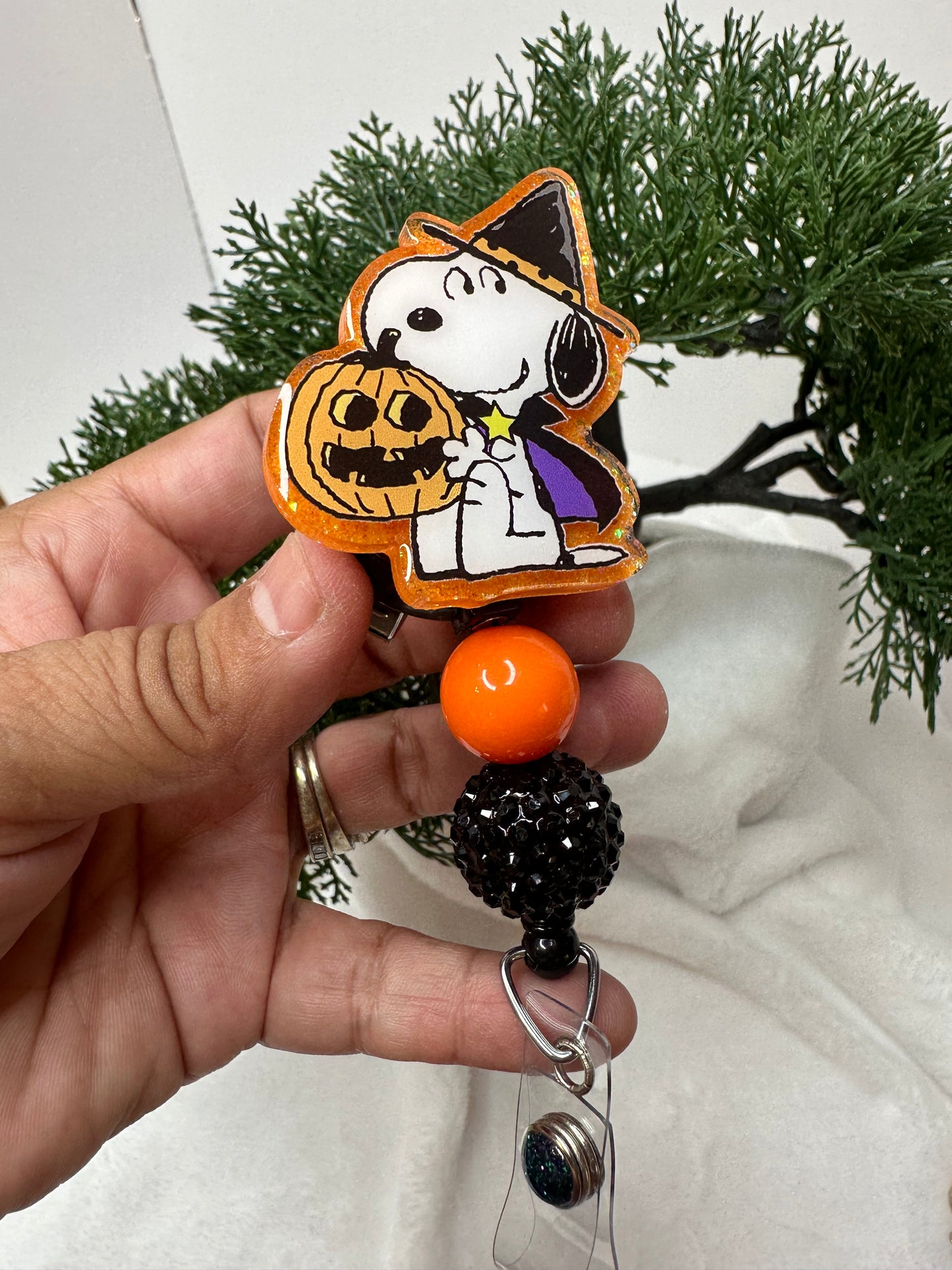 White Puppy Witch Badge Reel