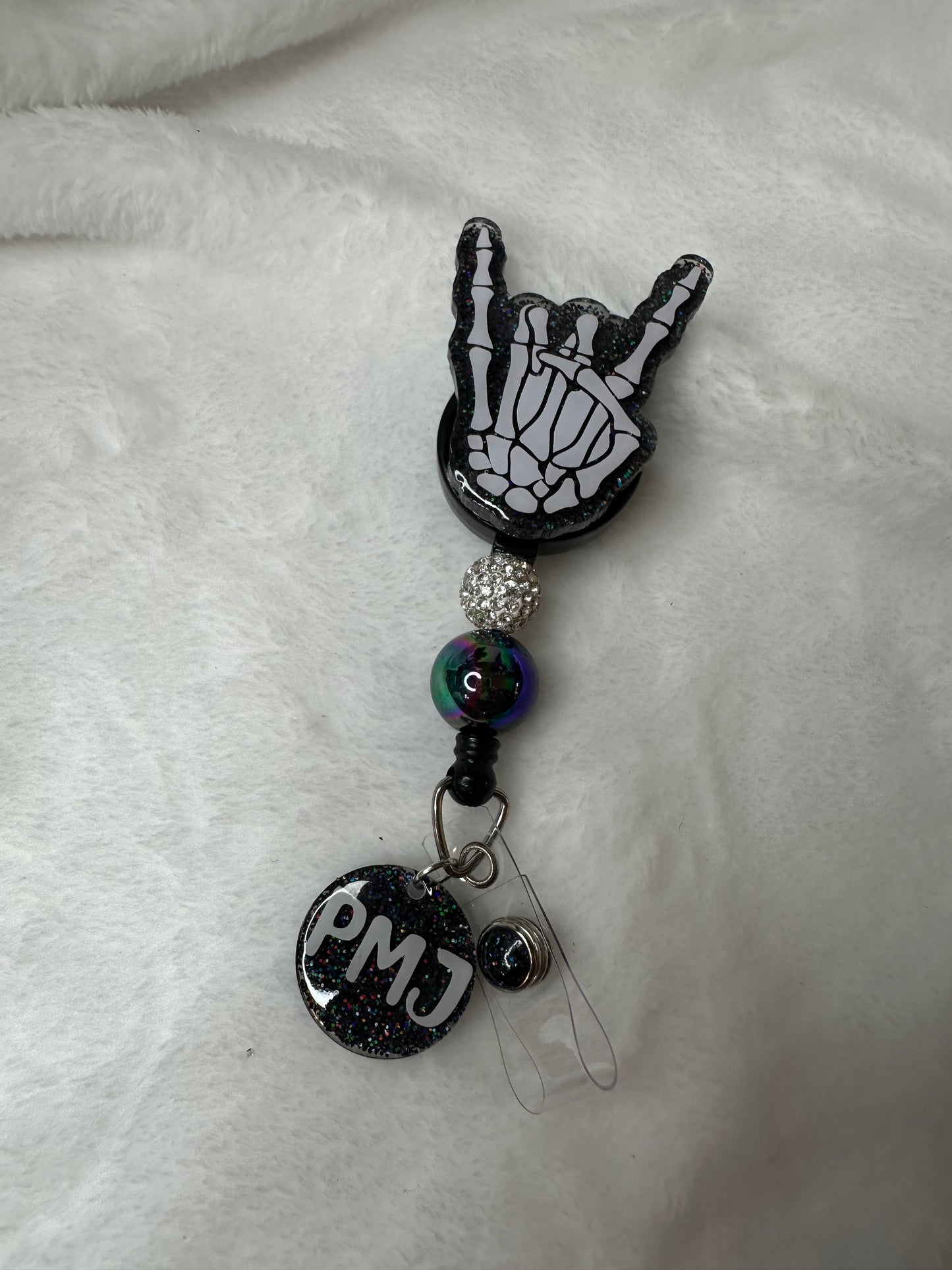 Hard Rock Skeleton Hand Badge Reel