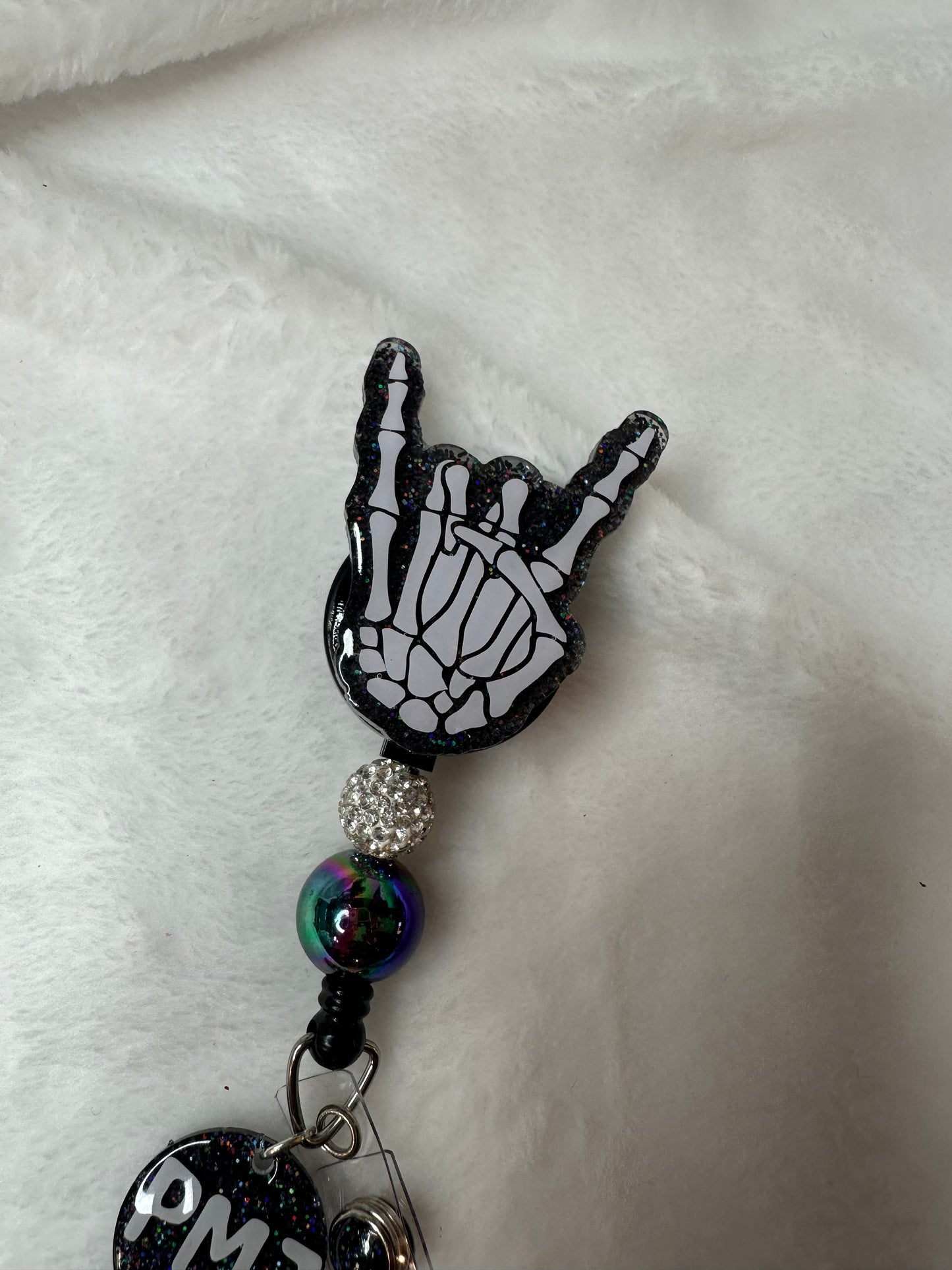 Hard Rock Skeleton Hand Badge Reel