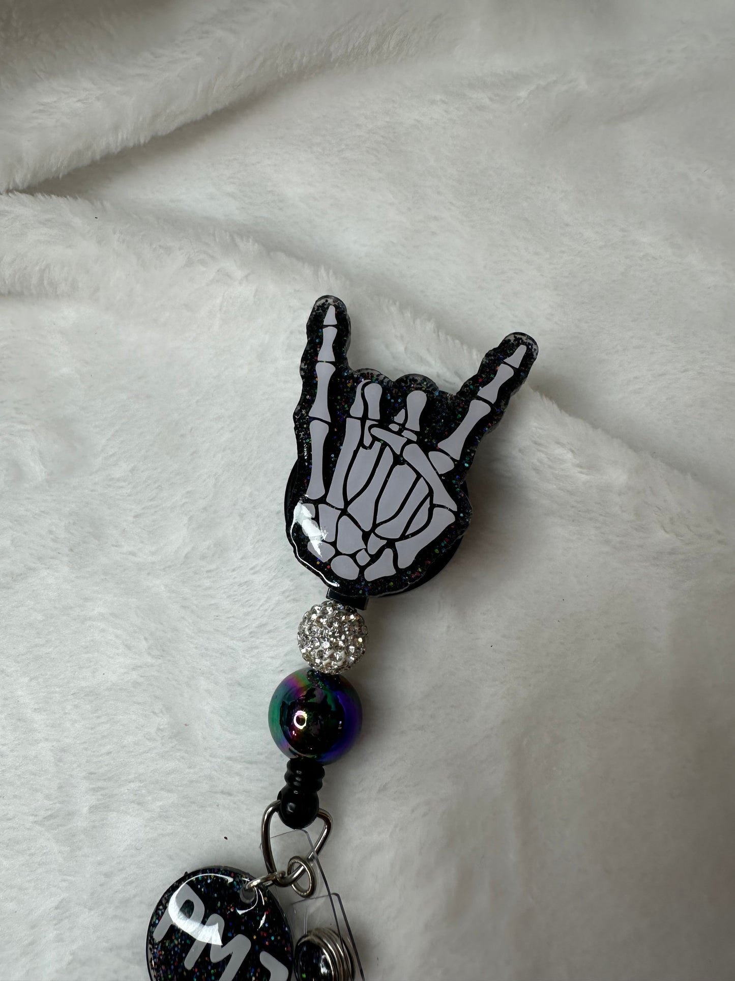 Hard Rock Skeleton Hand Badge Reel