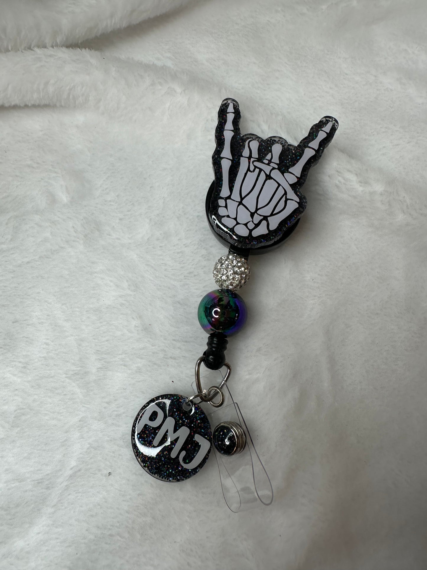 Hard Rock Skeleton Hand Badge Reel