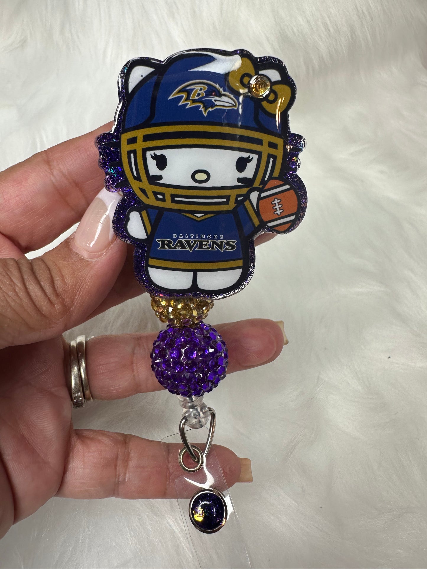 Kitty Football Purple/Gold Badge Reel