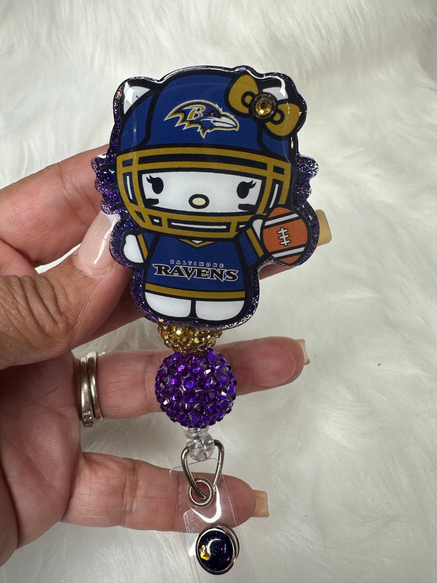 Kitty Football Purple/Gold Badge Reel