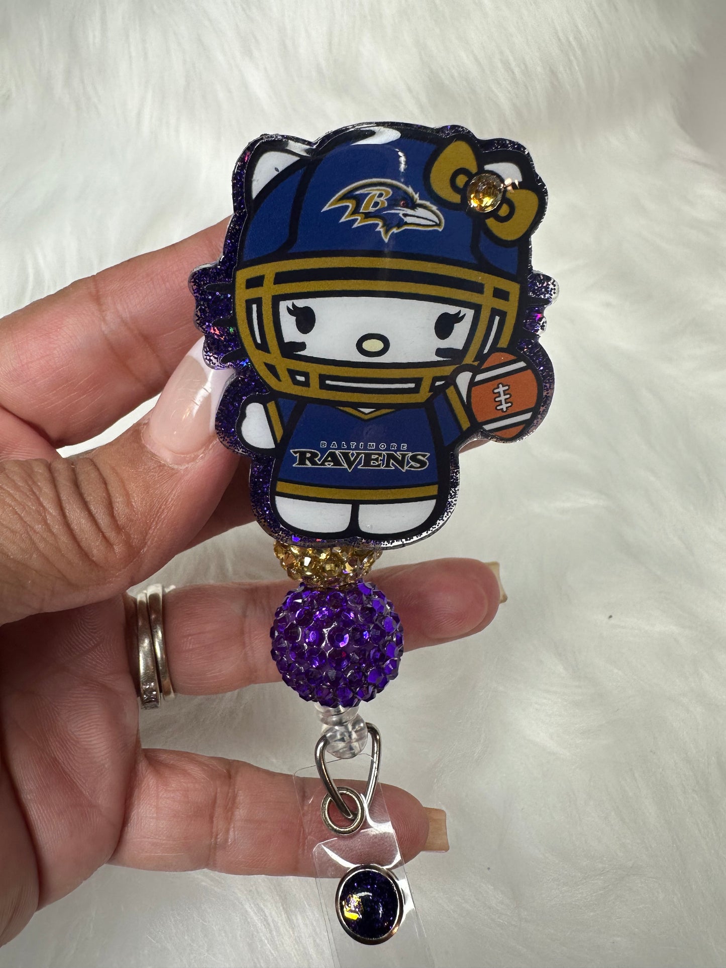 Kitty Football Purple/Gold Badge Reel