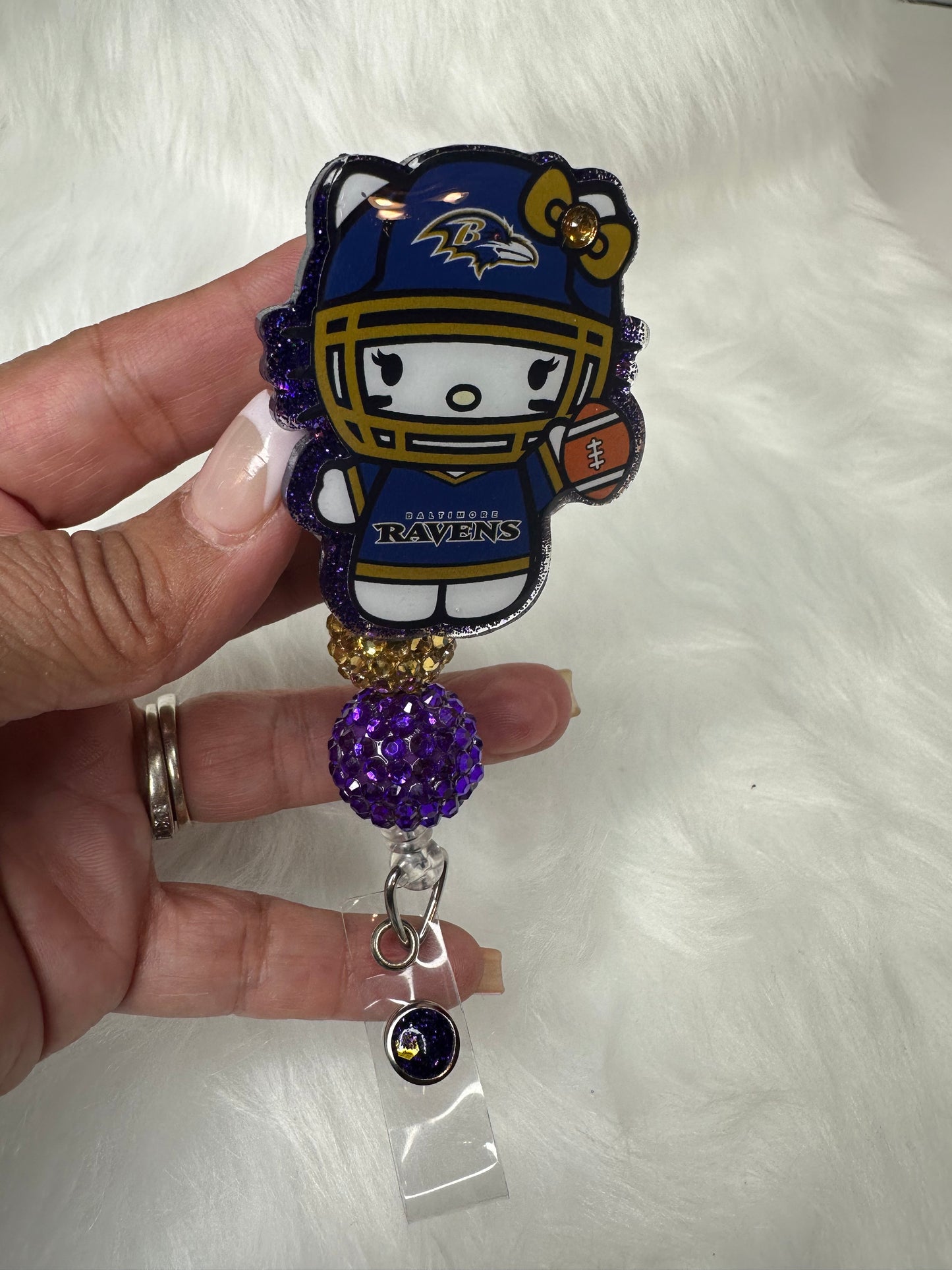 Kitty Football Purple/Gold Badge Reel