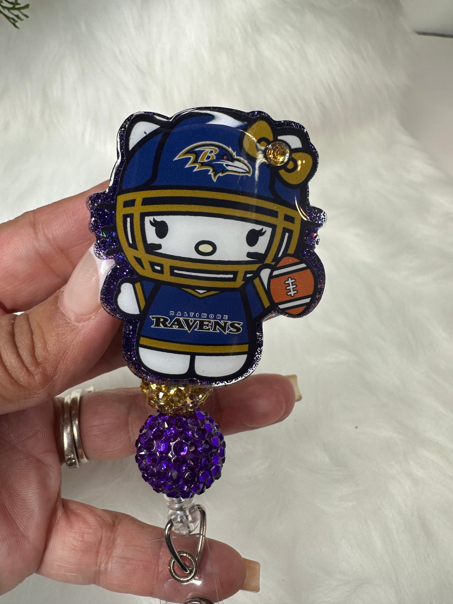 Kitty Football Purple/Gold Badge Reel