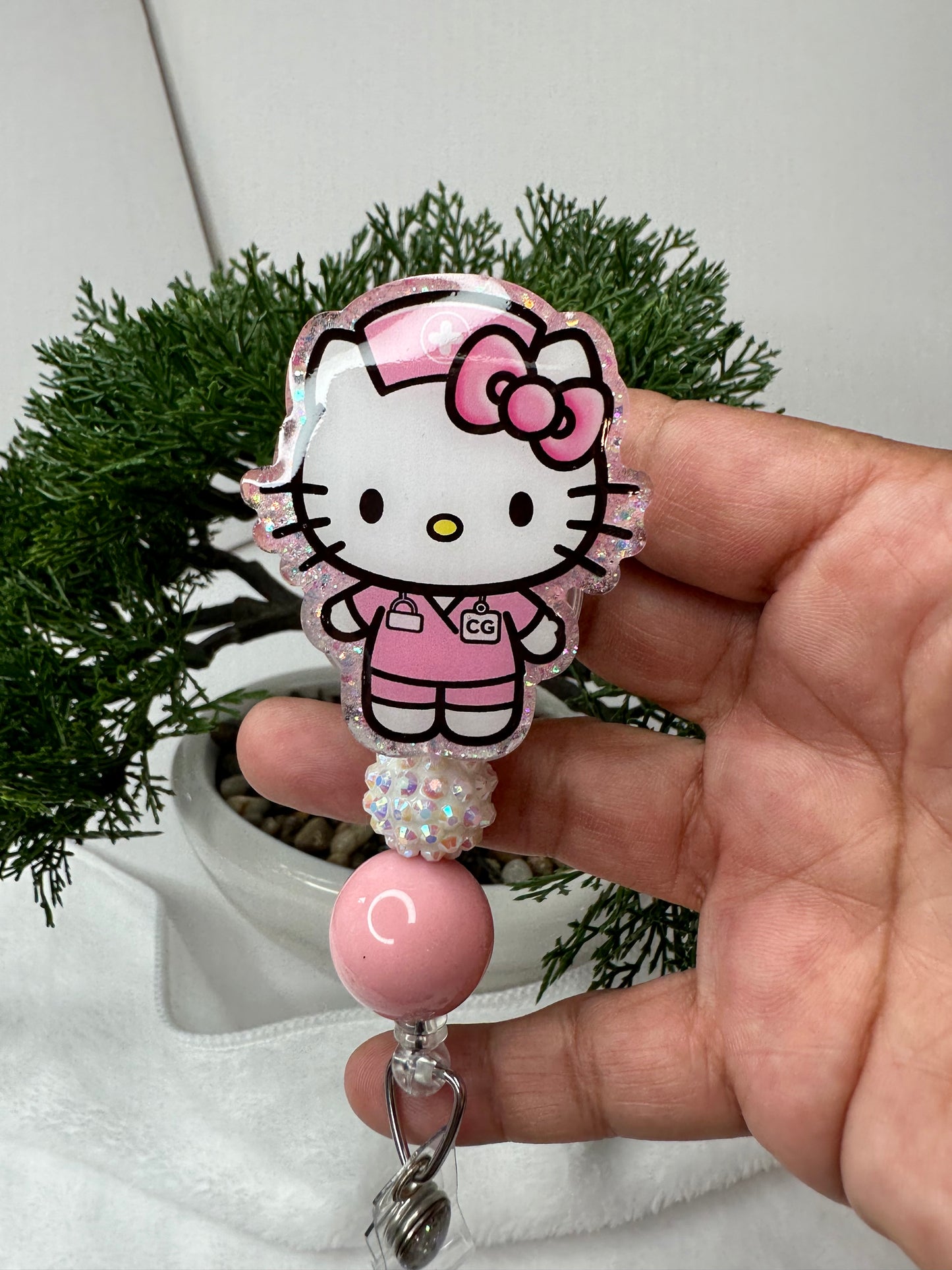 Kitty CG Caregiver Badge Reel