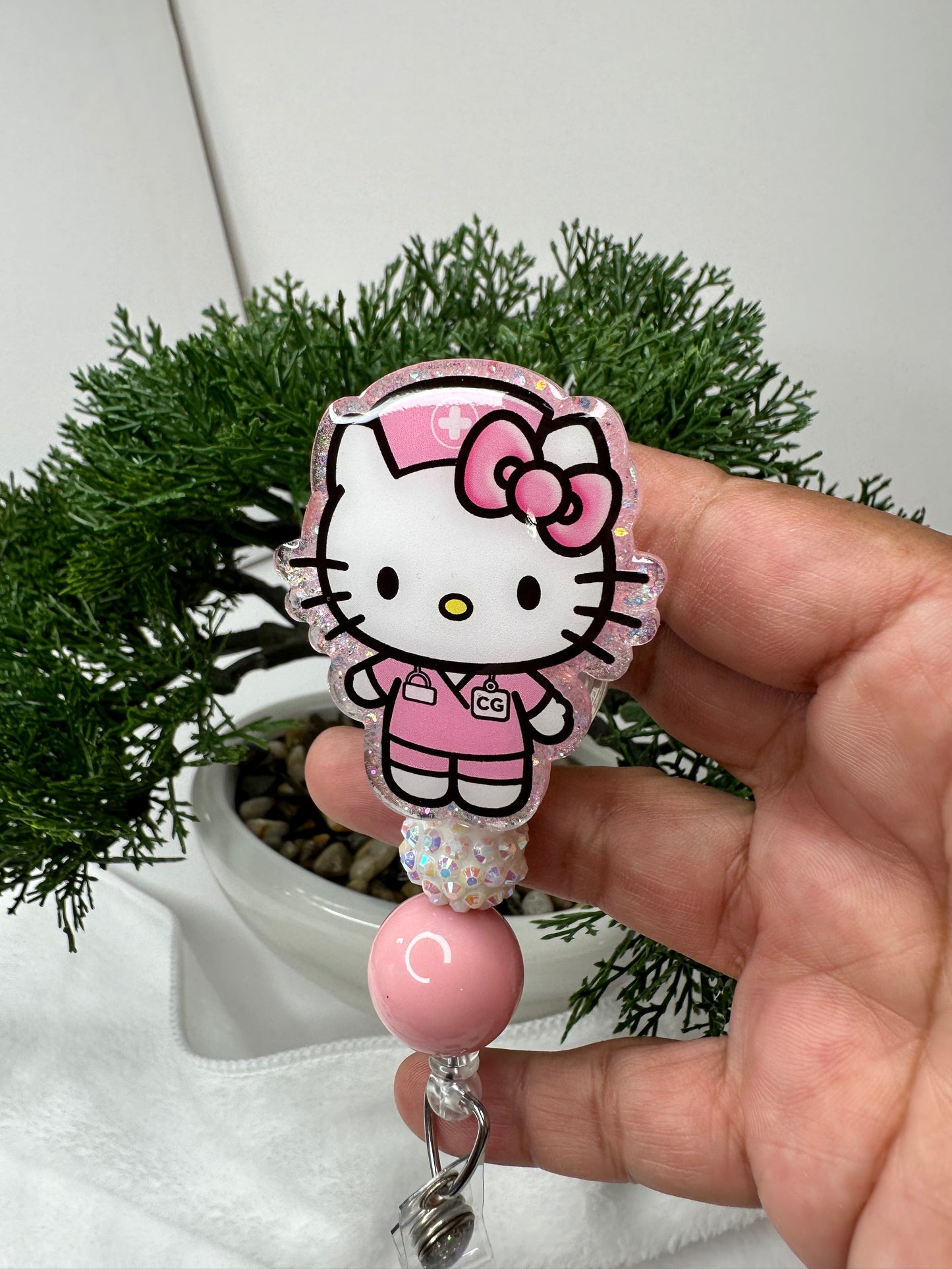 Kitty CG Caregiver Badge Reel