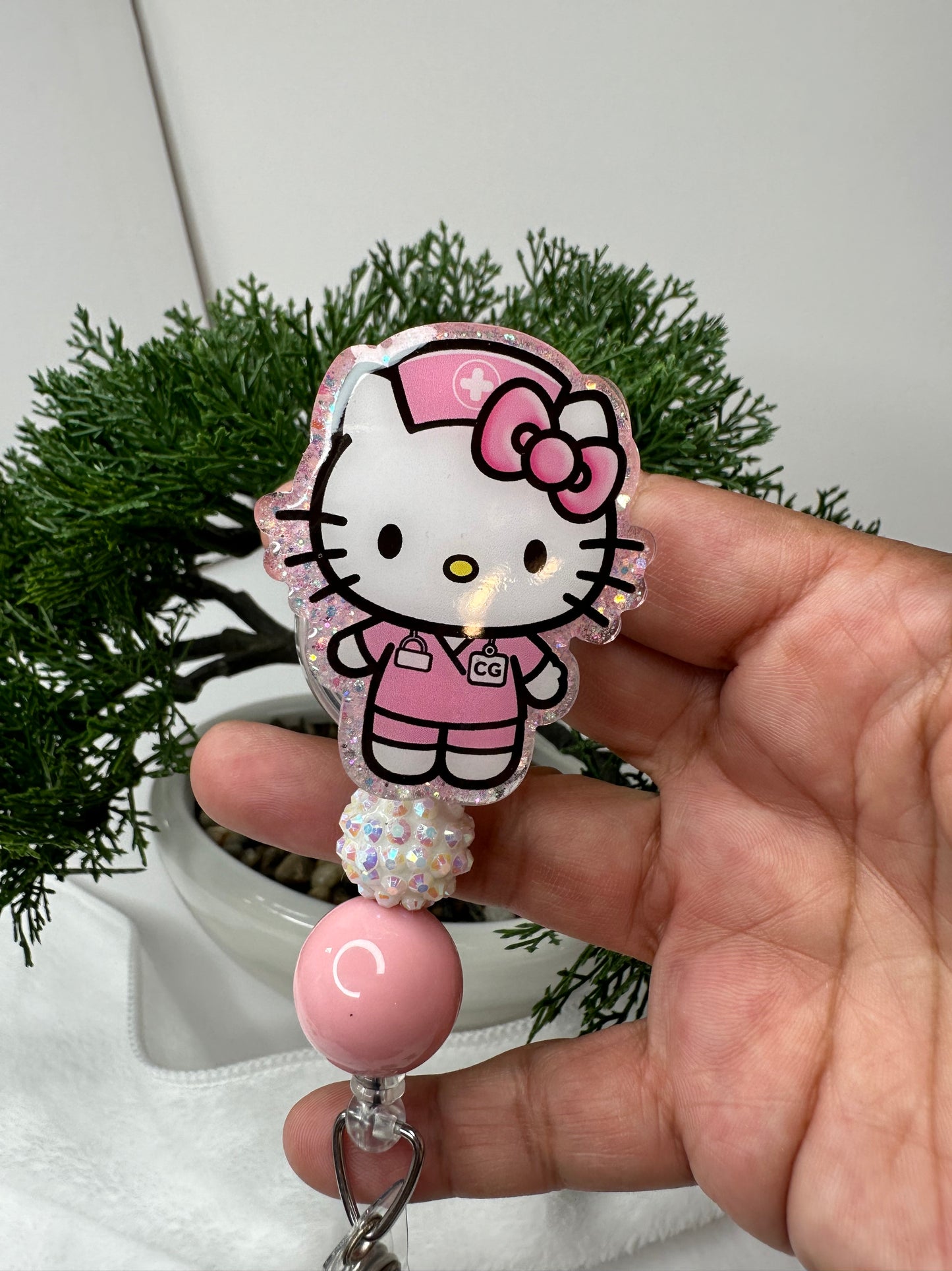 Kitty CG Caregiver Badge Reel