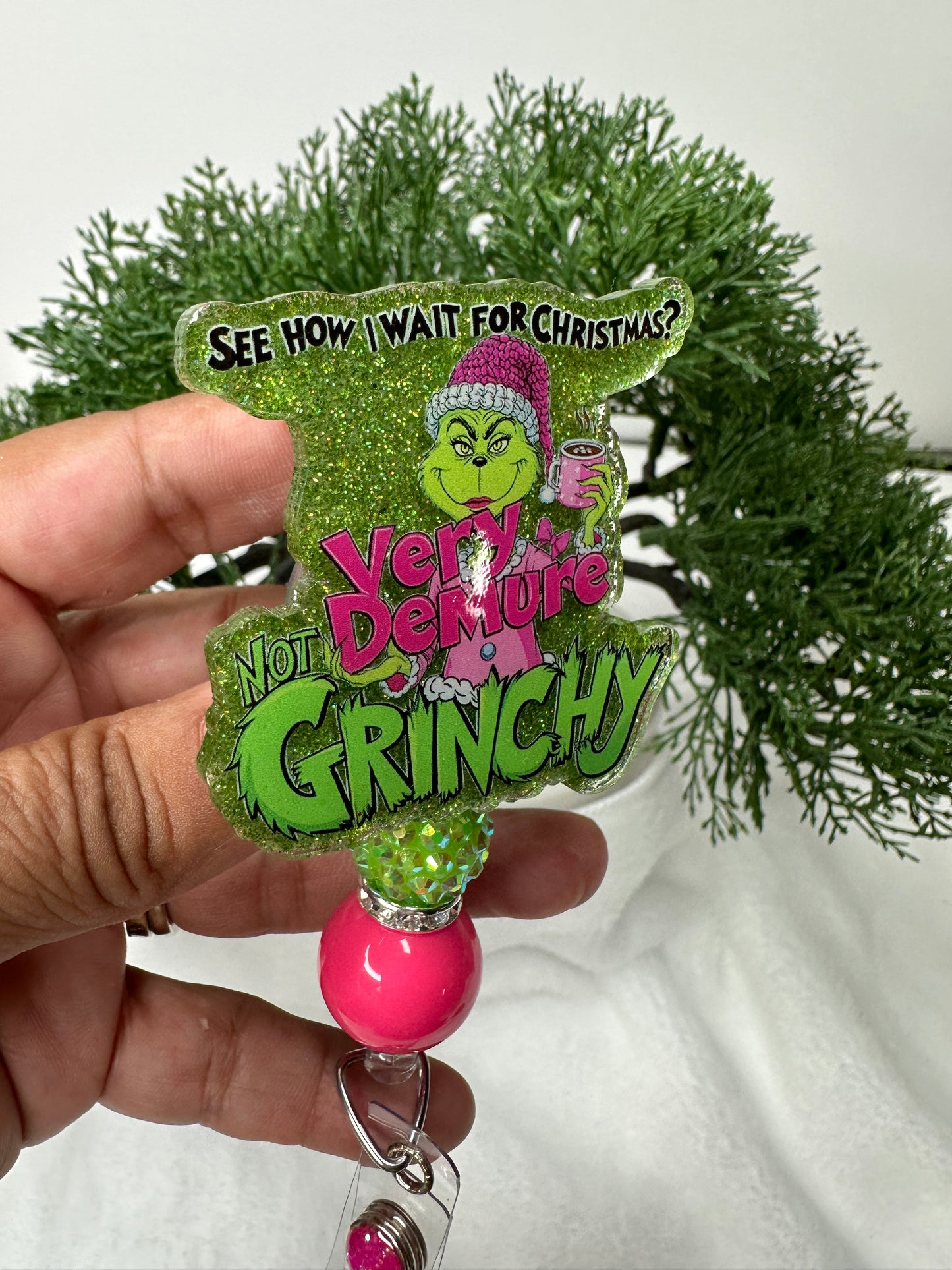 Very Demure Not Grinchy Badge Reel