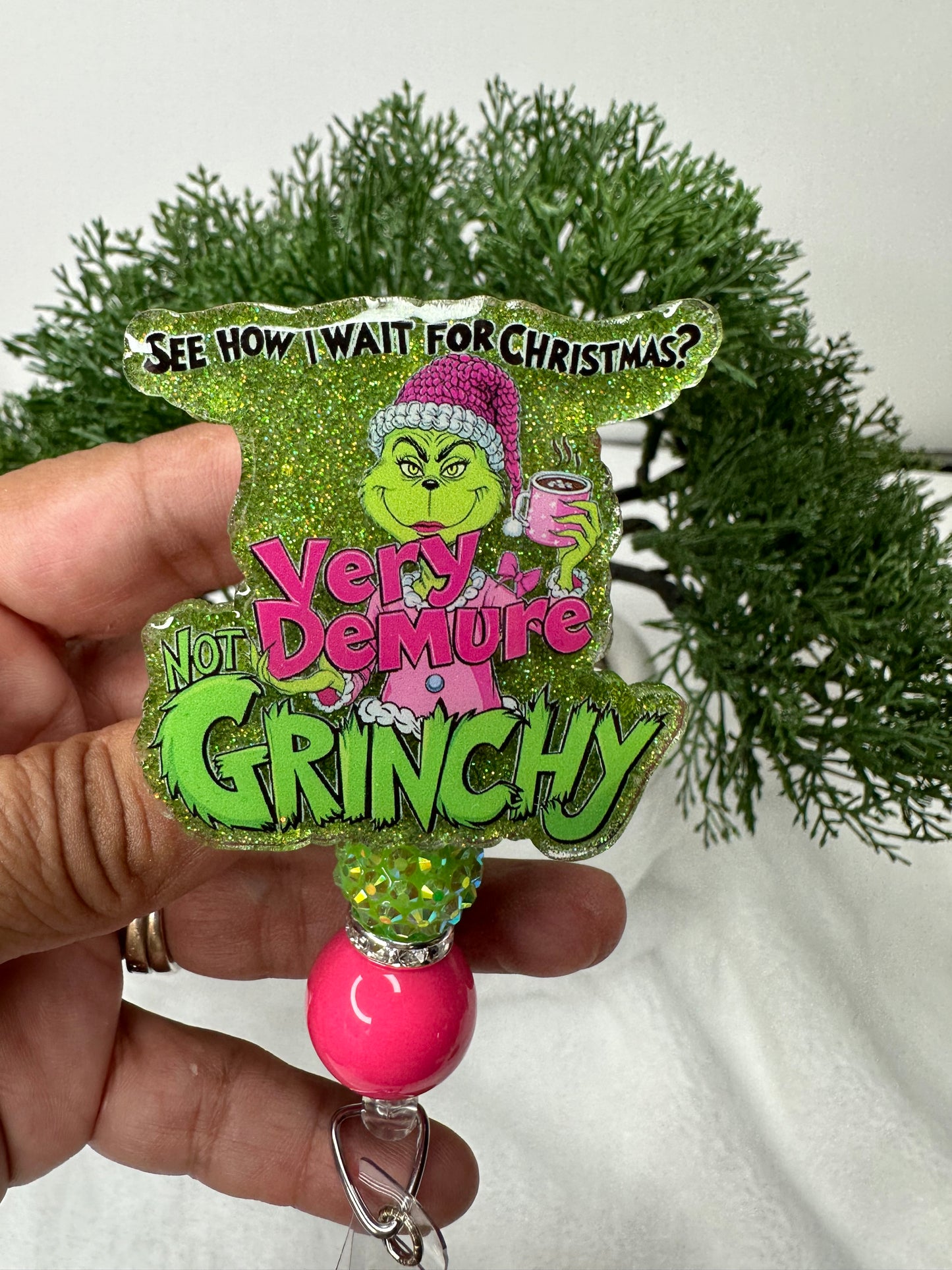 Very Demure Not Grinchy Badge Reel