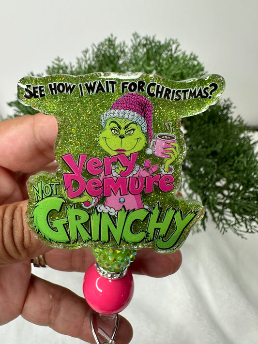 Very Demure Not Grinchy Badge Reel