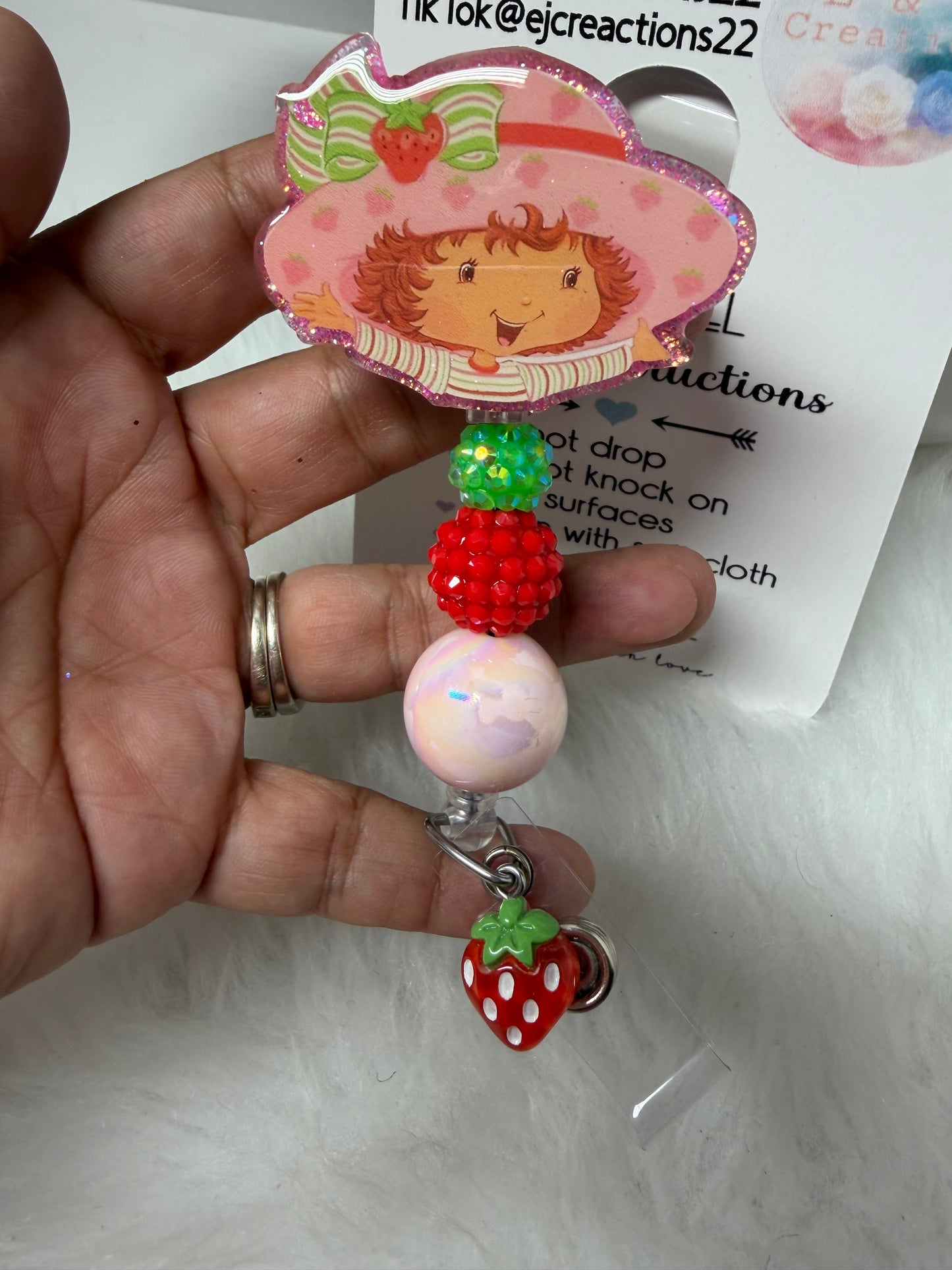 03 Strawberry Girl Badge Reel