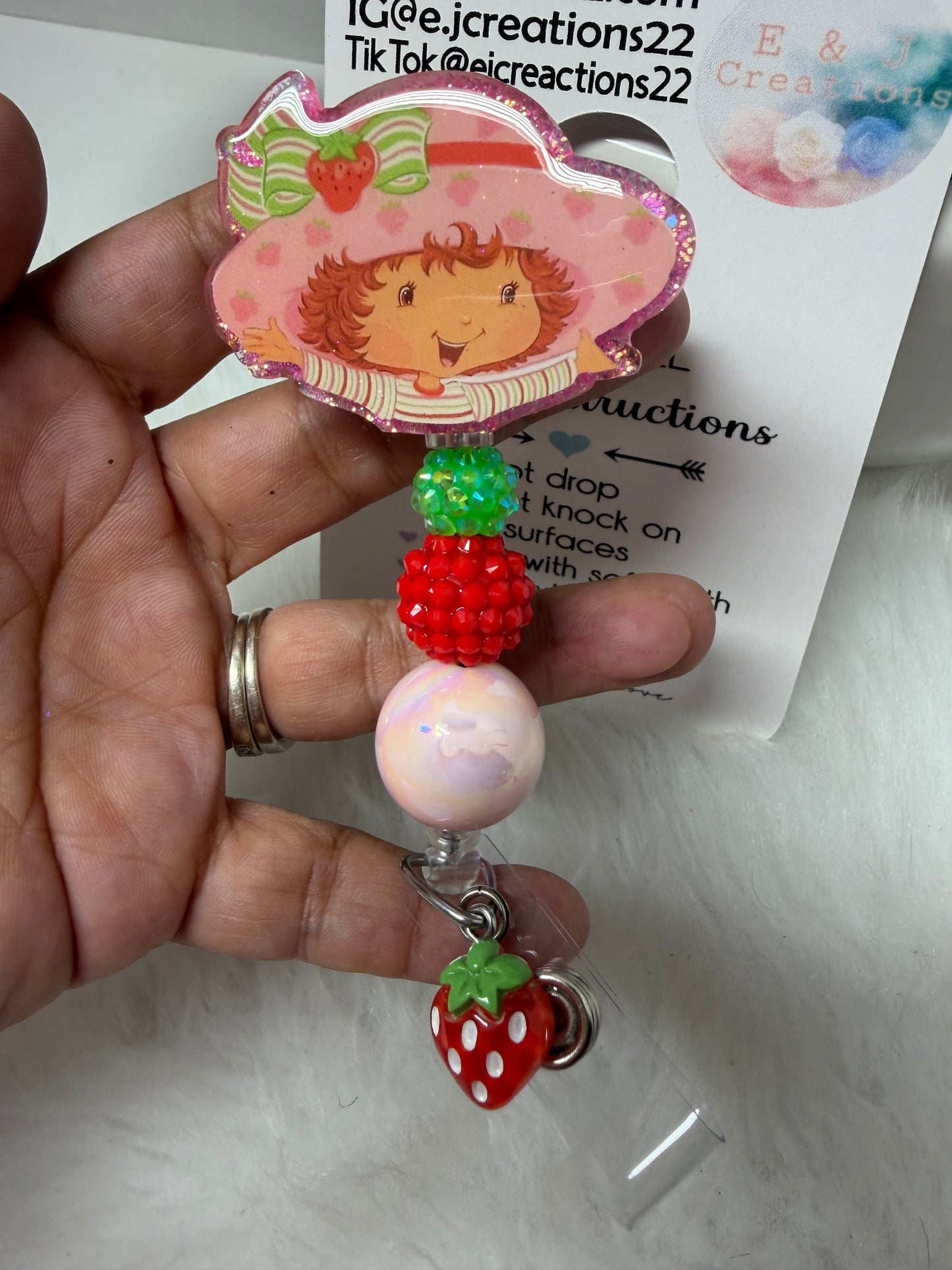 03 Strawberry Girl Badge Reel