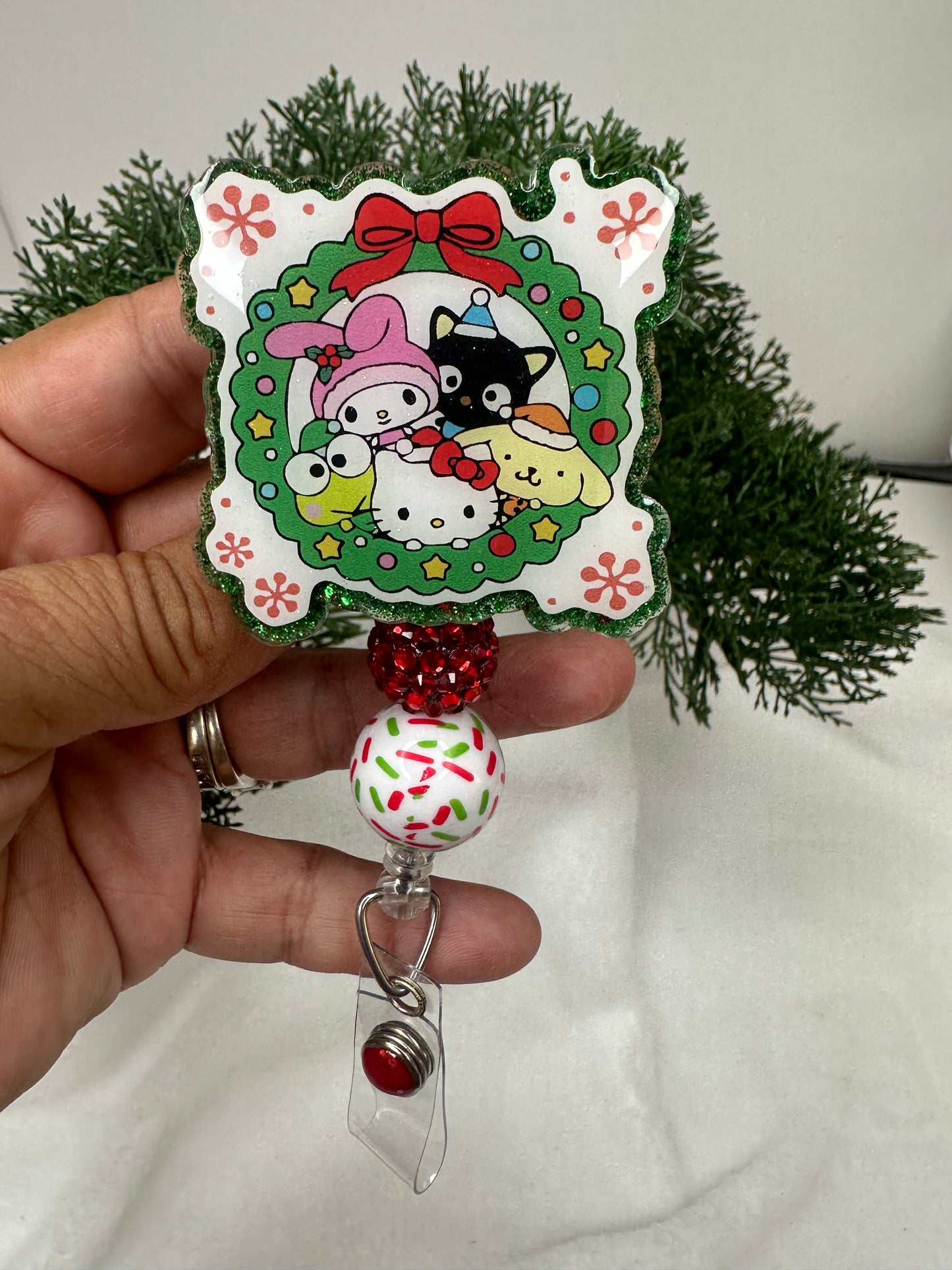 Kitty and Friends Wreath Badge Reel