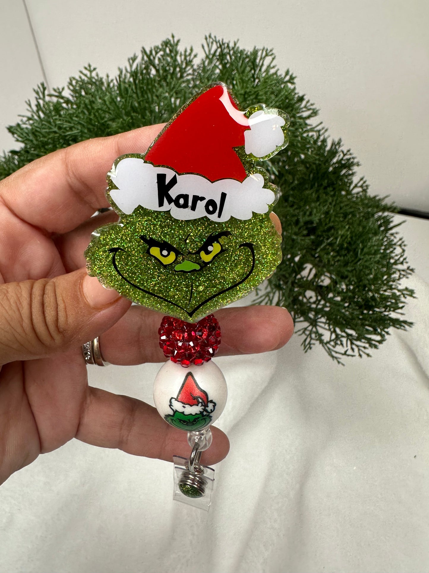 Grinch Santa Badge Reel