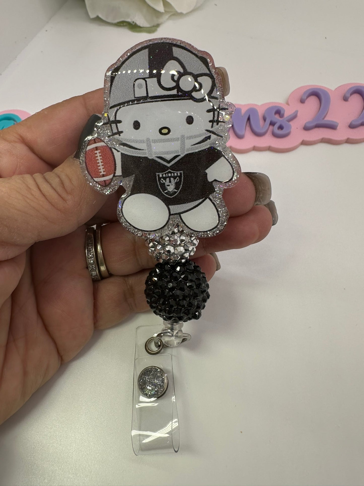 Kitty Silver Nation Badge Reel