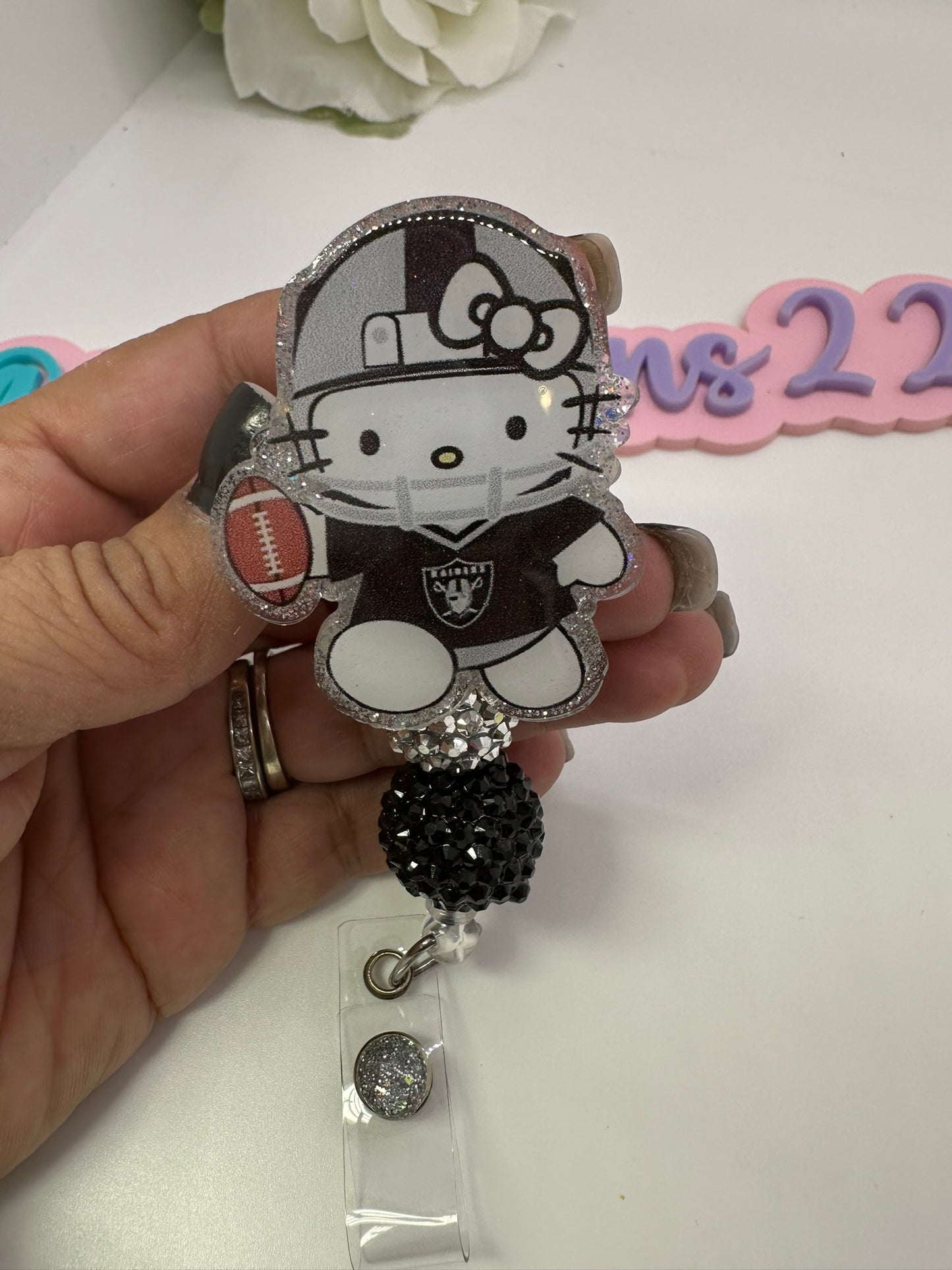 Kitty Silver Nation Badge Reel