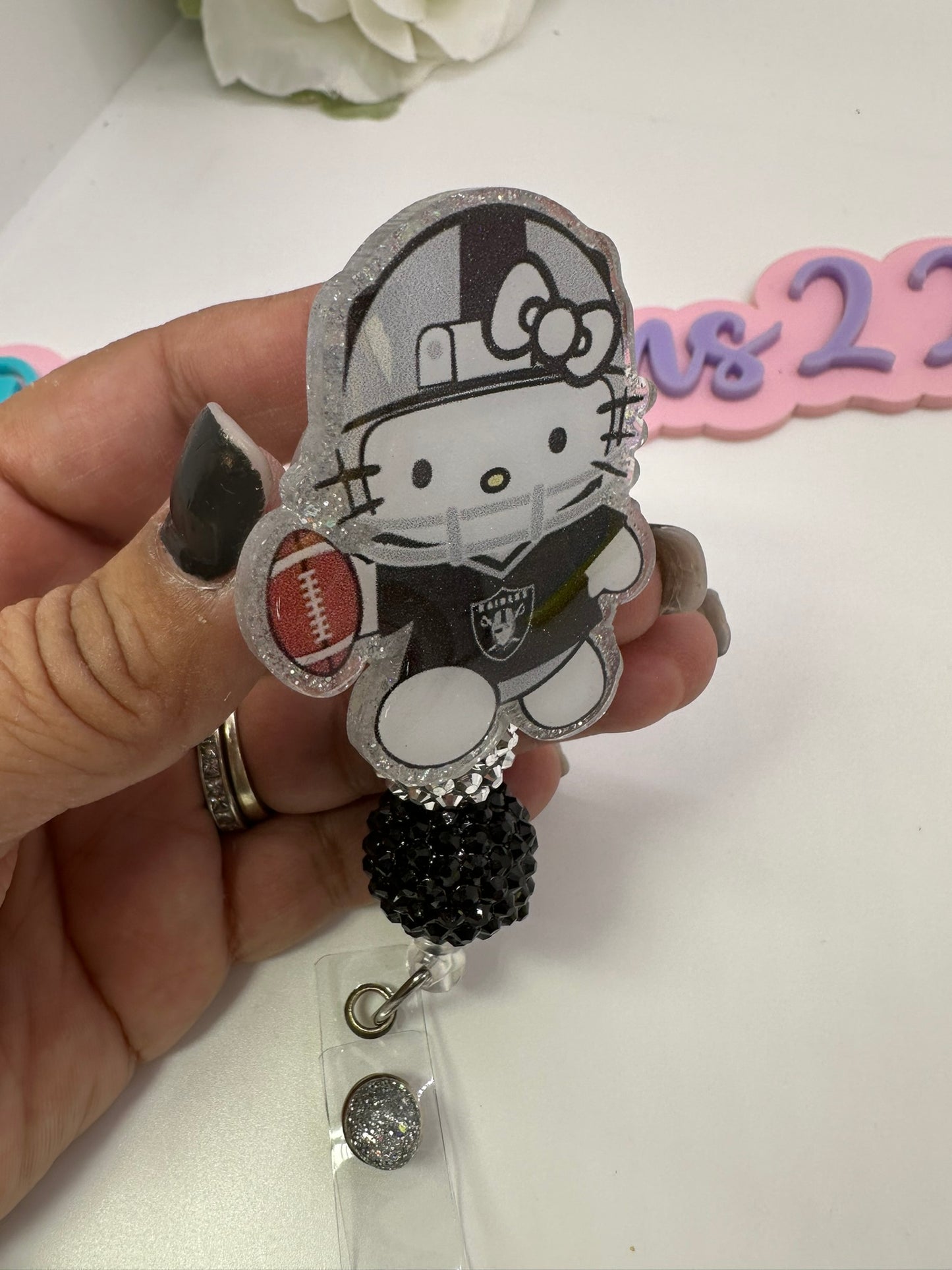 Kitty Silver Nation Badge Reel