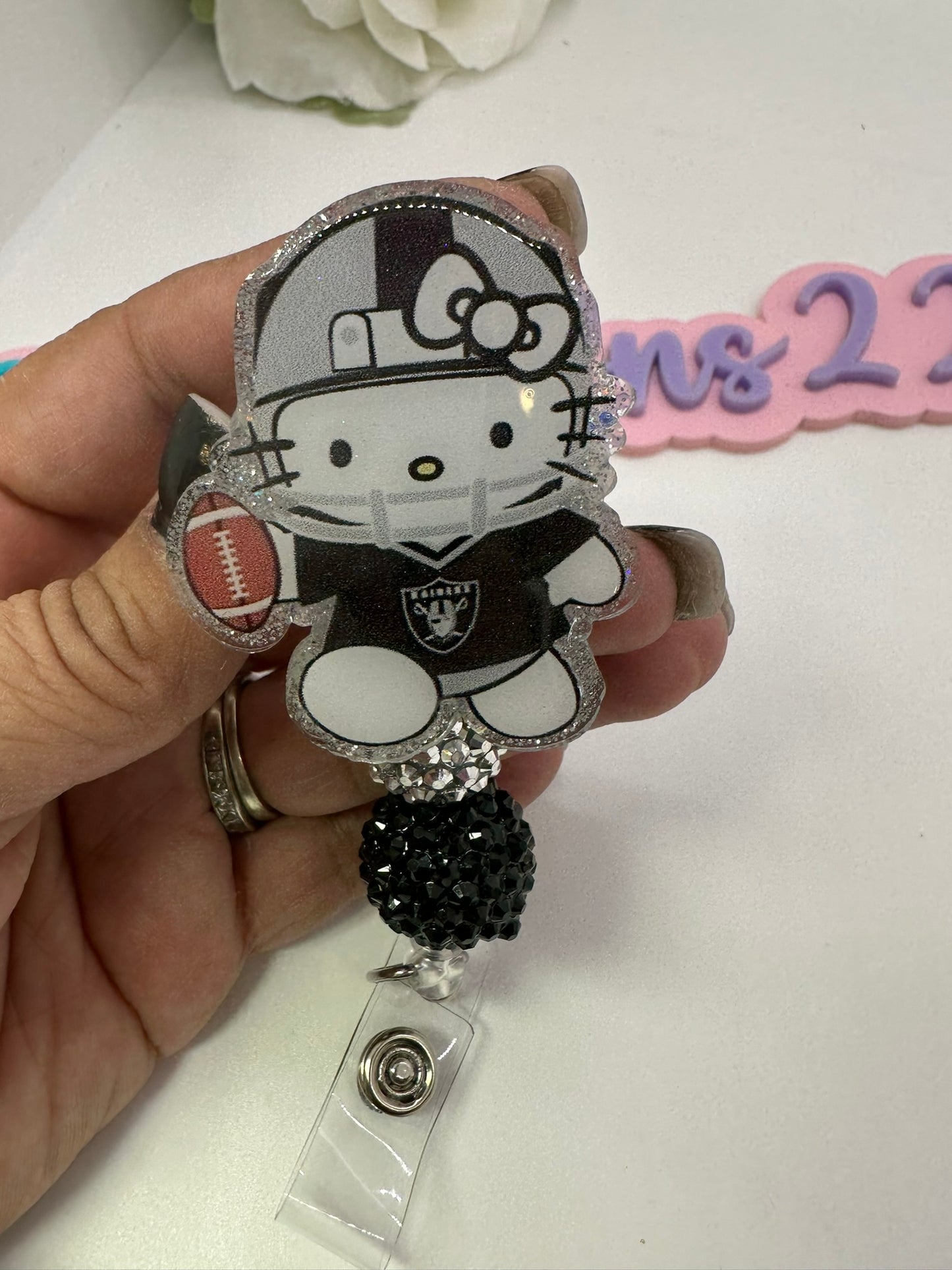 Kitty Silver Nation Badge Reel