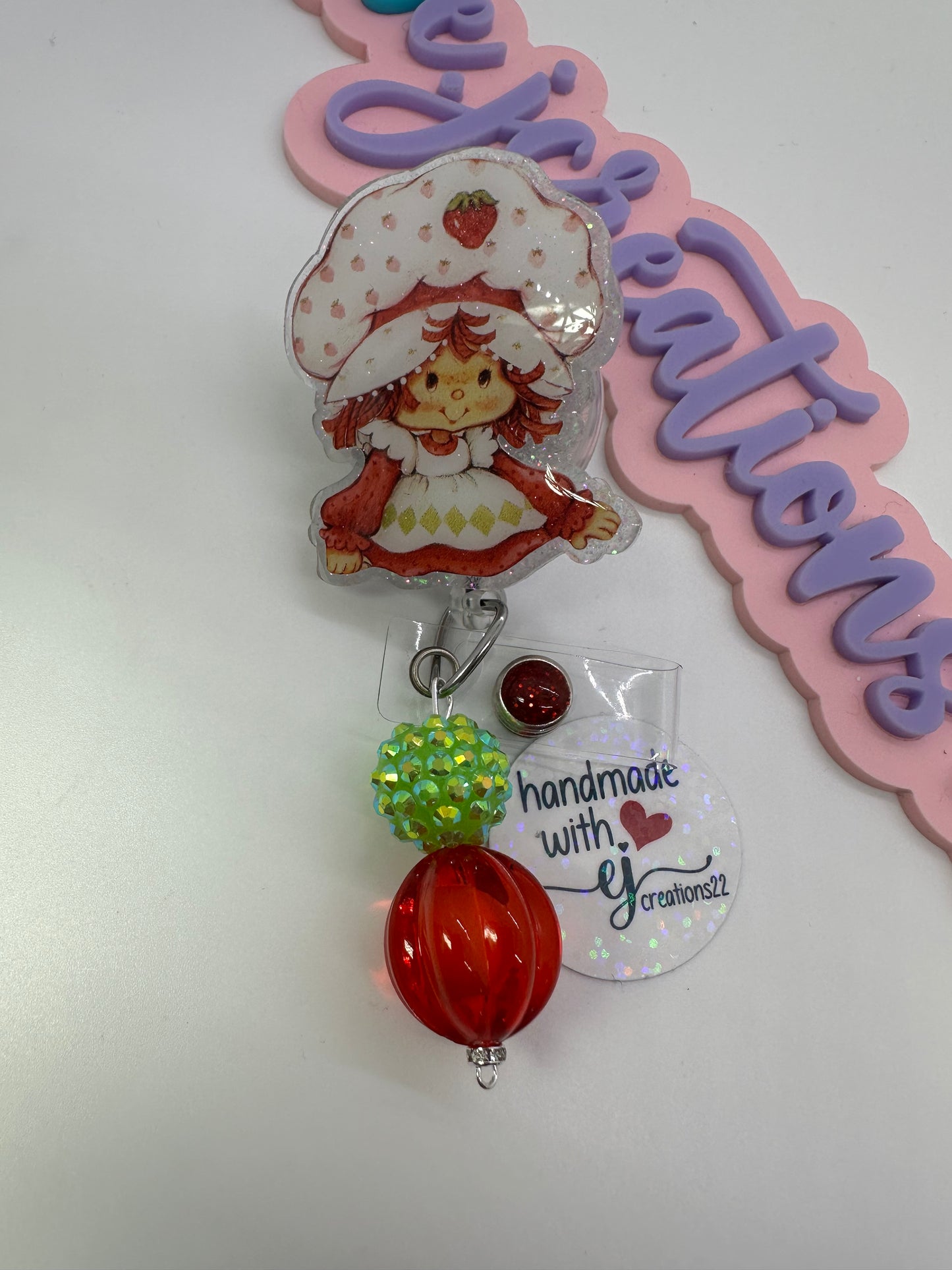 Strawberry Girl Badge Reel