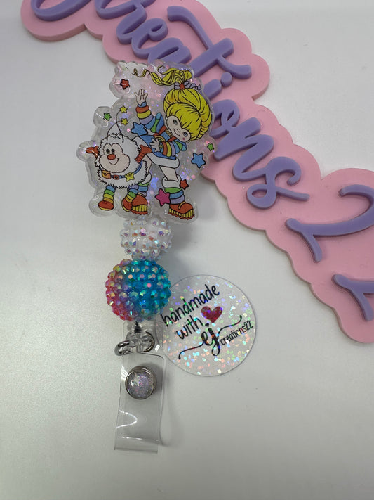 Rainbow Girl and Twink Cartoon Badge Reel