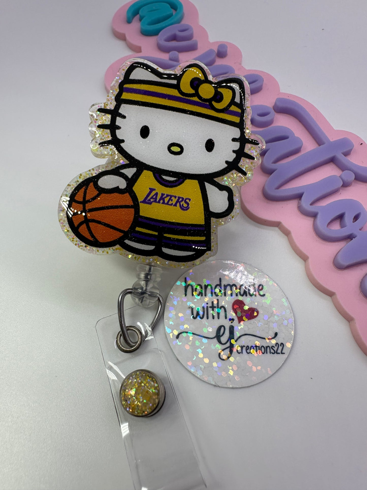 Kitty Basketball Purple & Gold Badge Reel