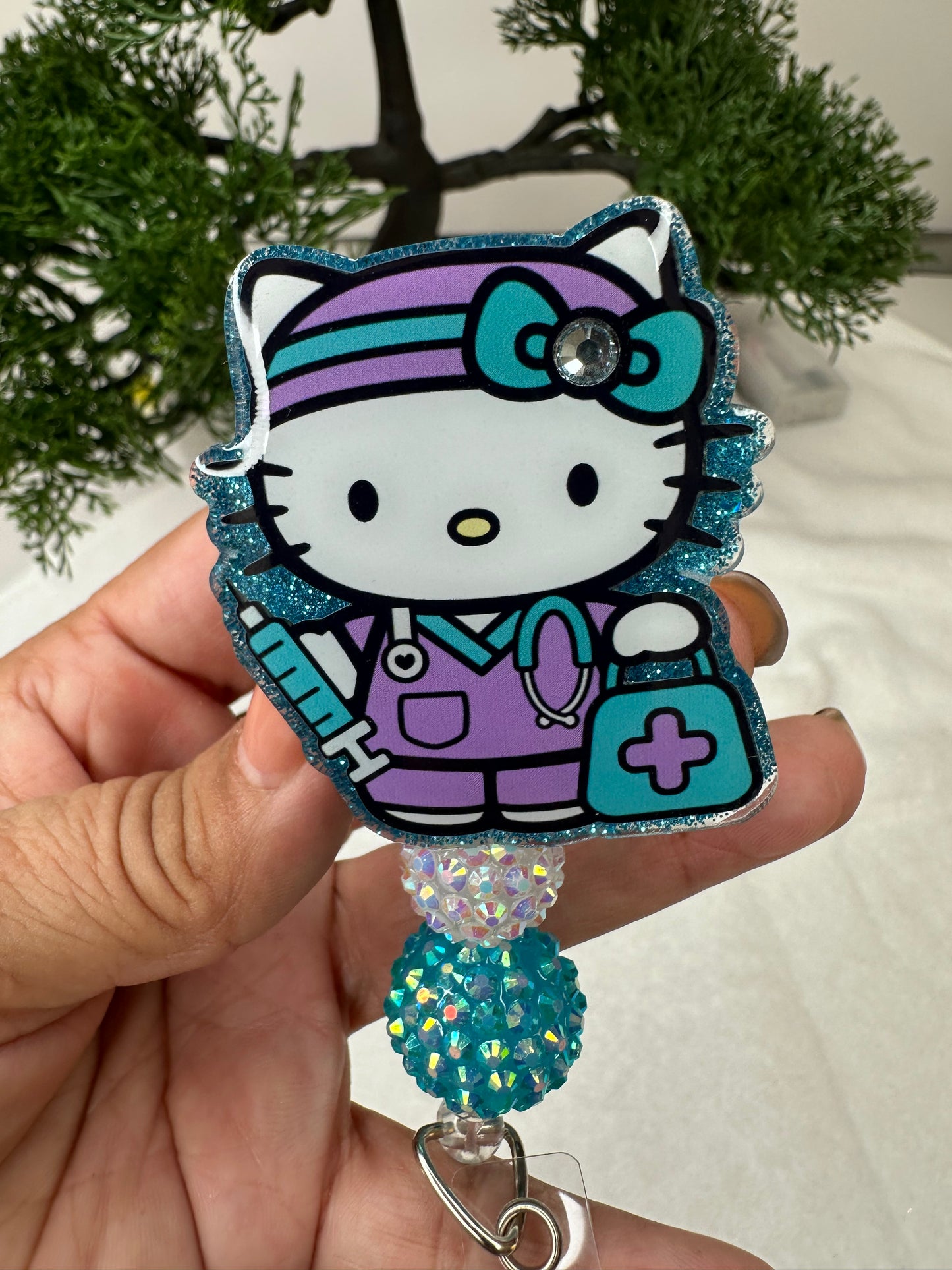 Turquoise Kitty Nurse Badge Reel