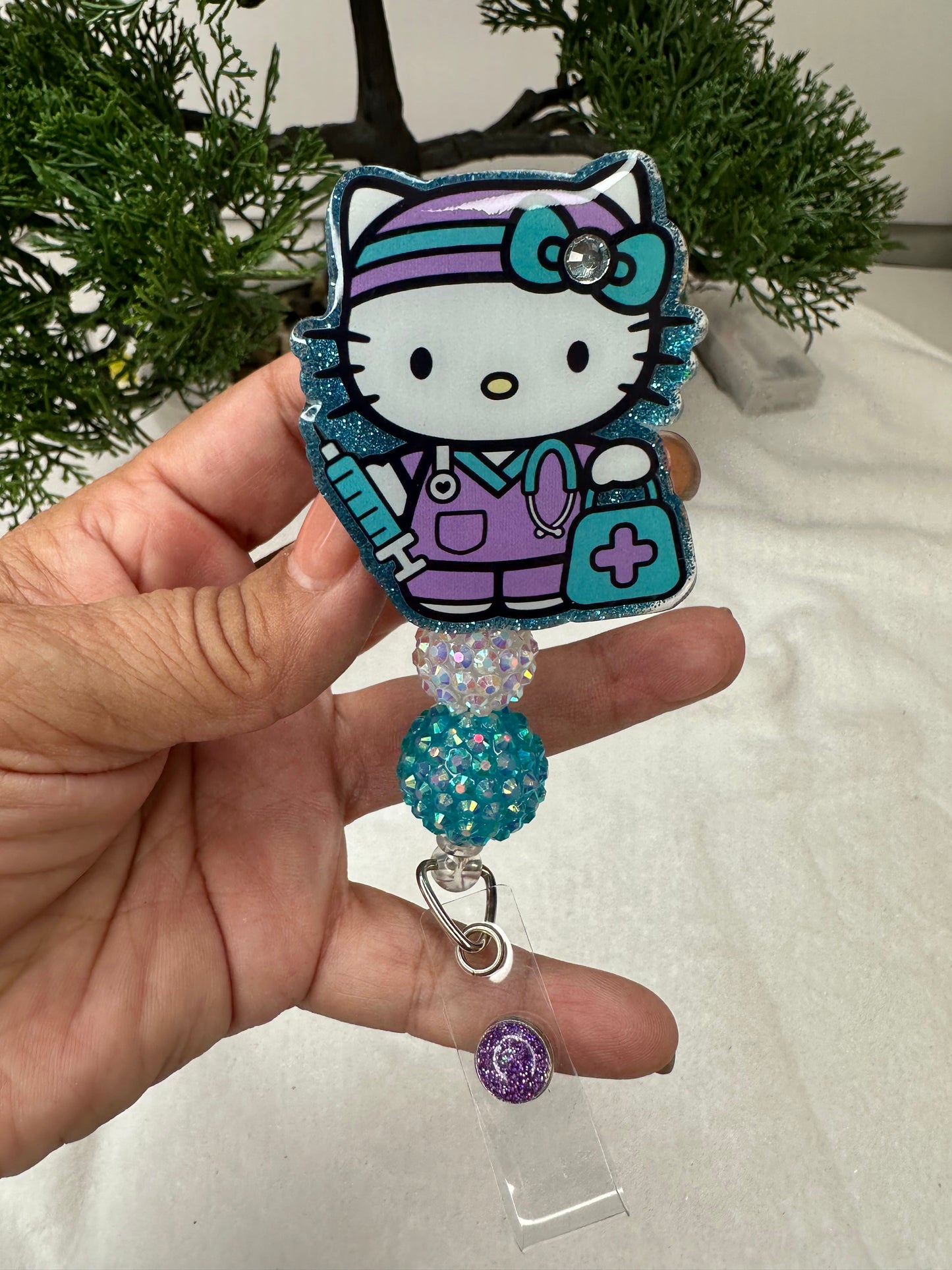 Turquoise Kitty Nurse Badge Reel