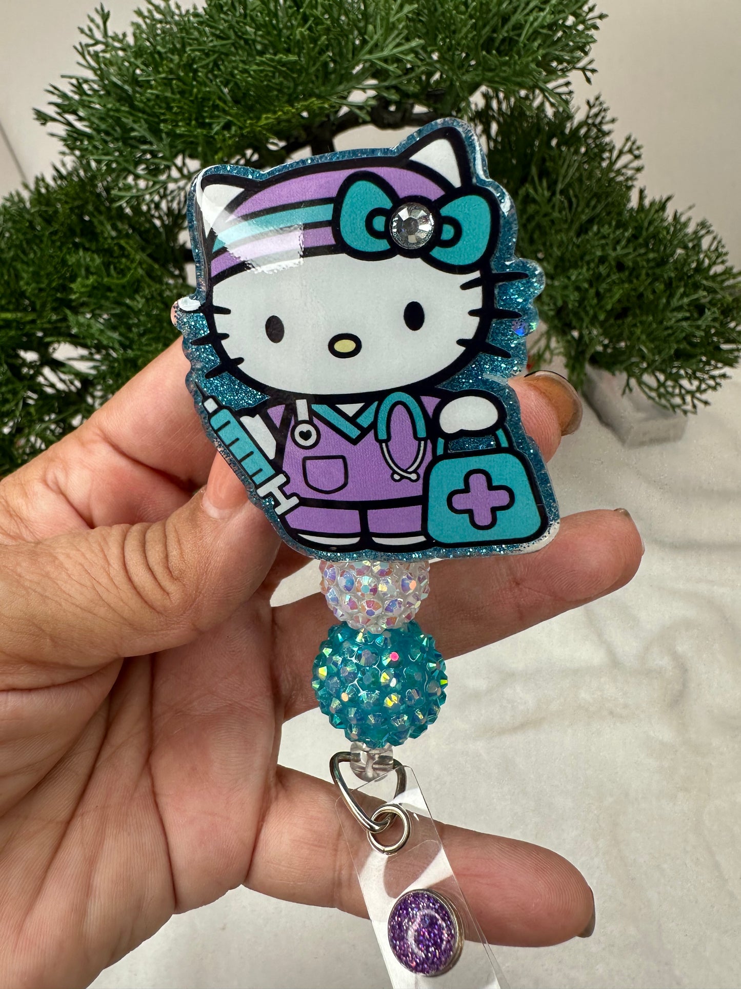 Turquoise Kitty Nurse Badge Reel