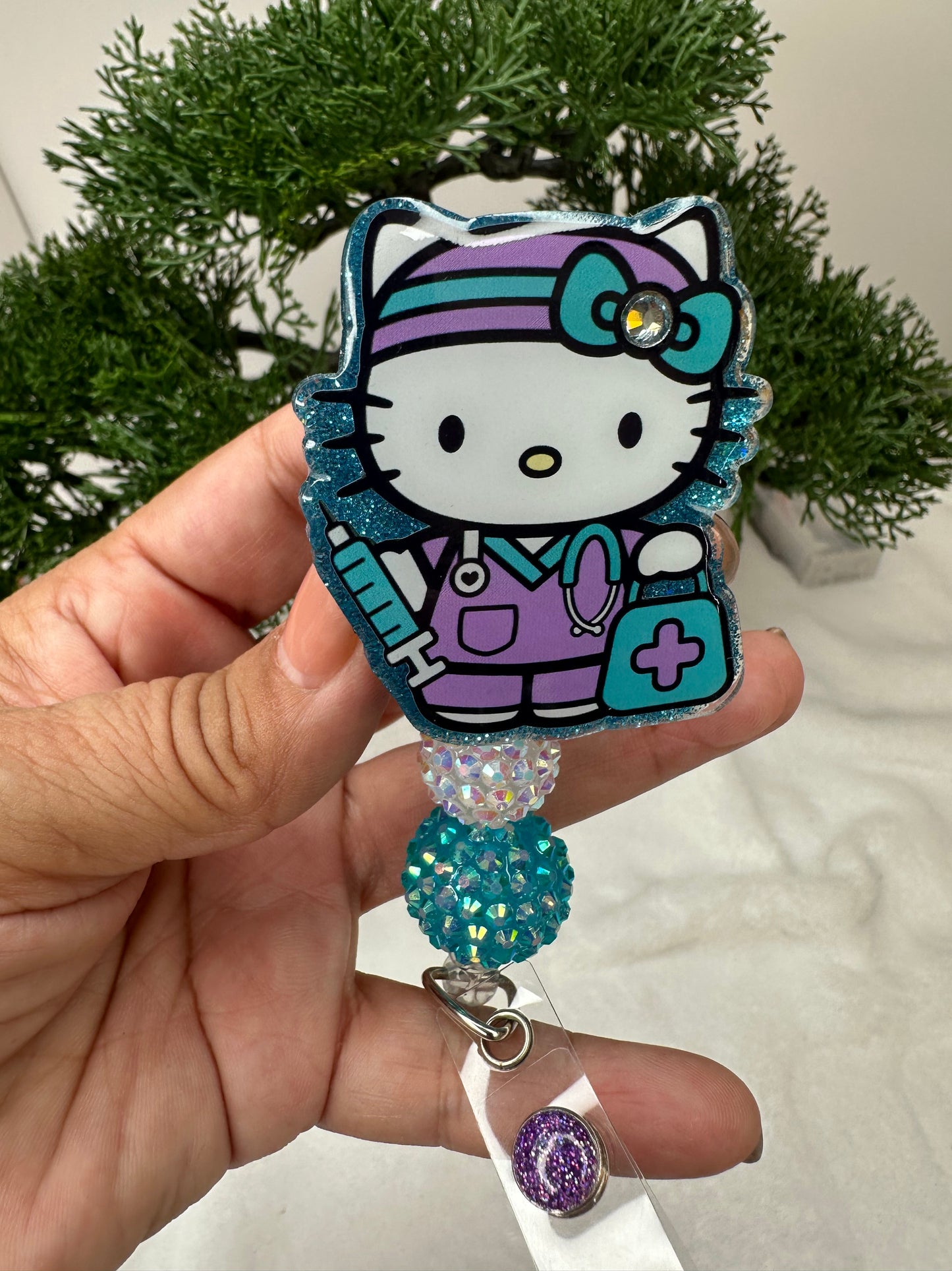 Turquoise Kitty Nurse Badge Reel