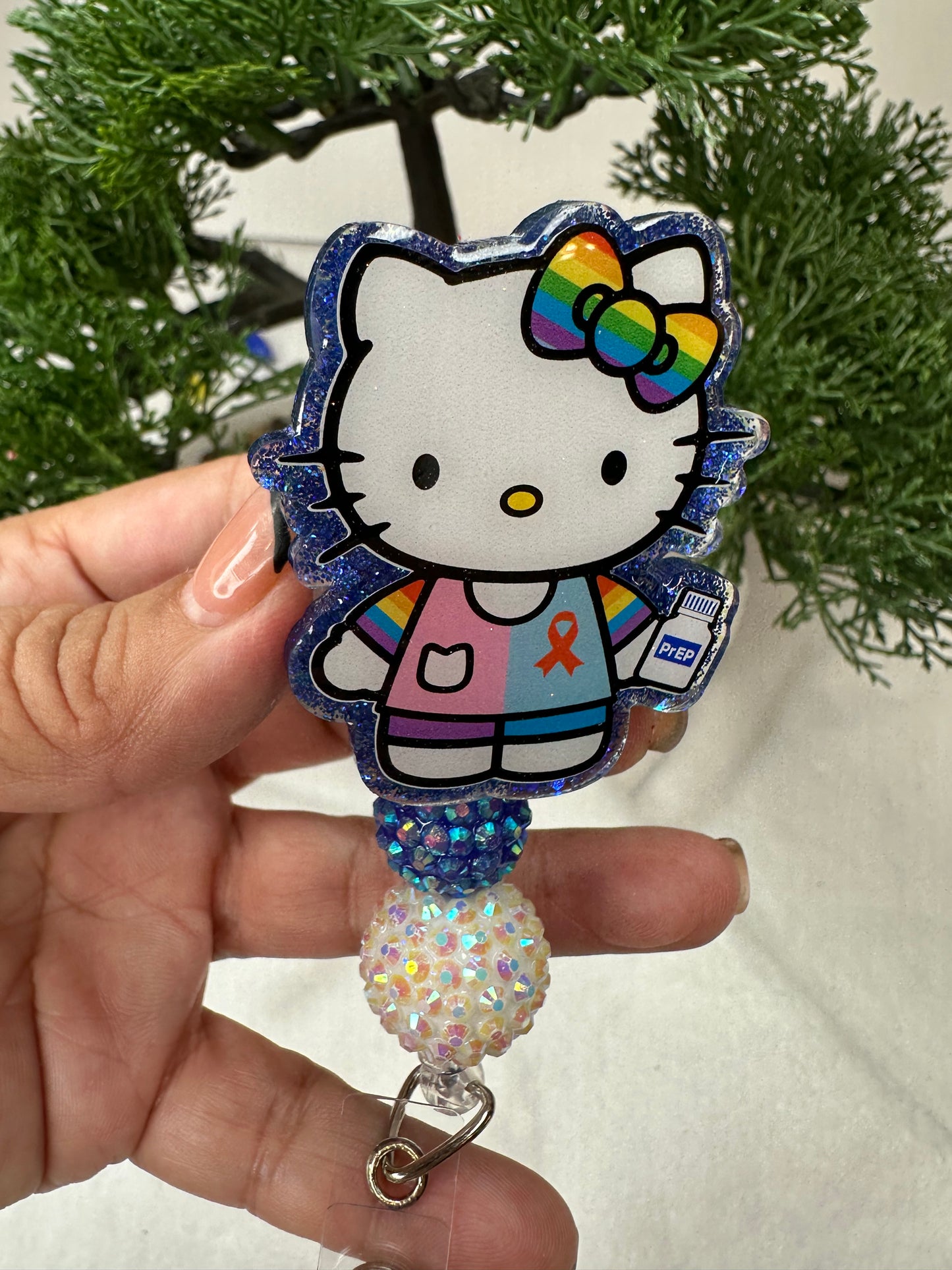 Kitty Aids Awareness Badge Reel