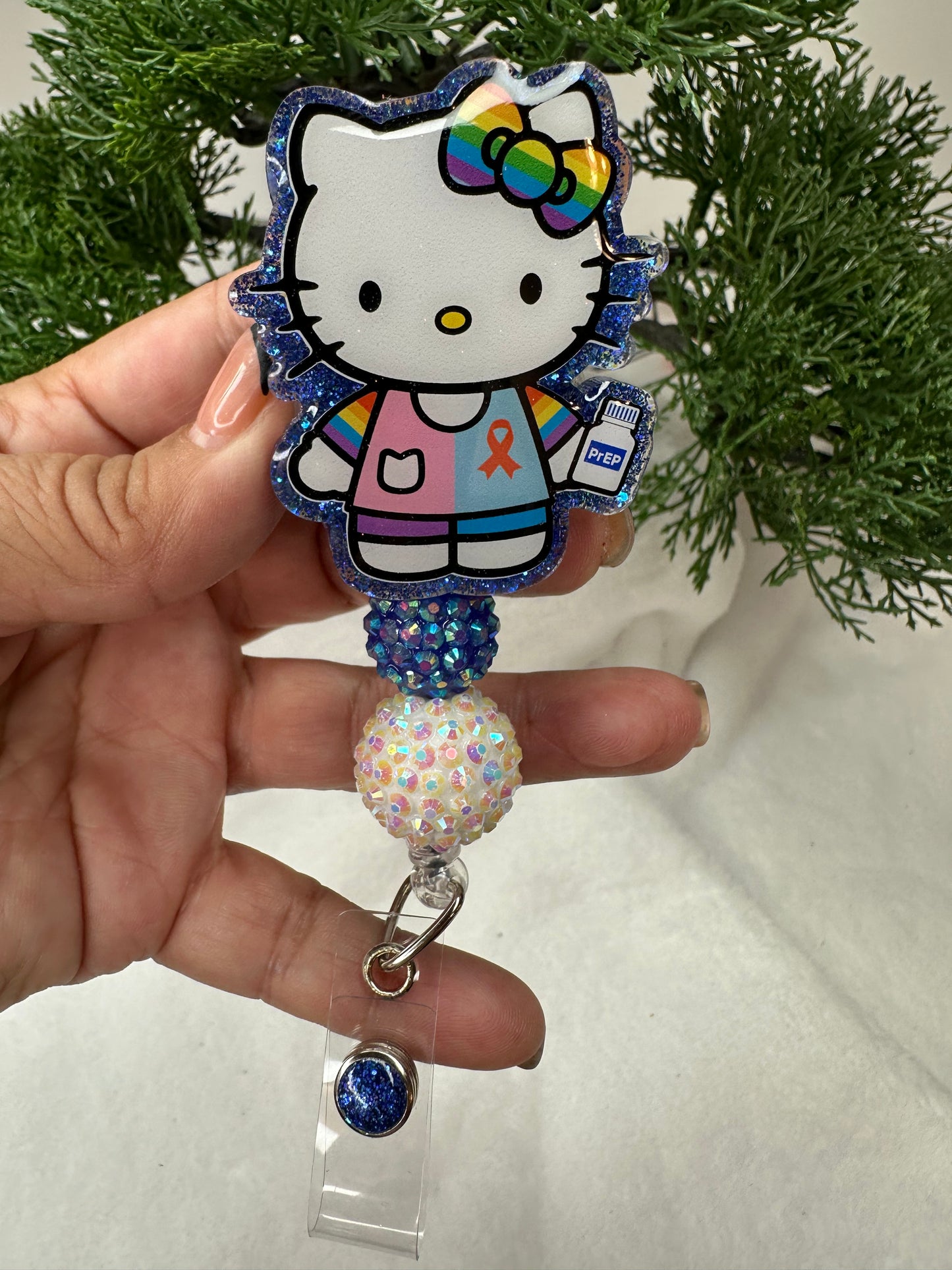 Kitty Aids Awareness Badge Reel