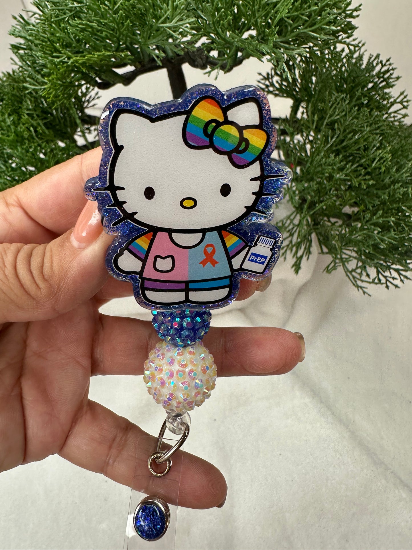 Kitty Aids Awareness Badge Reel