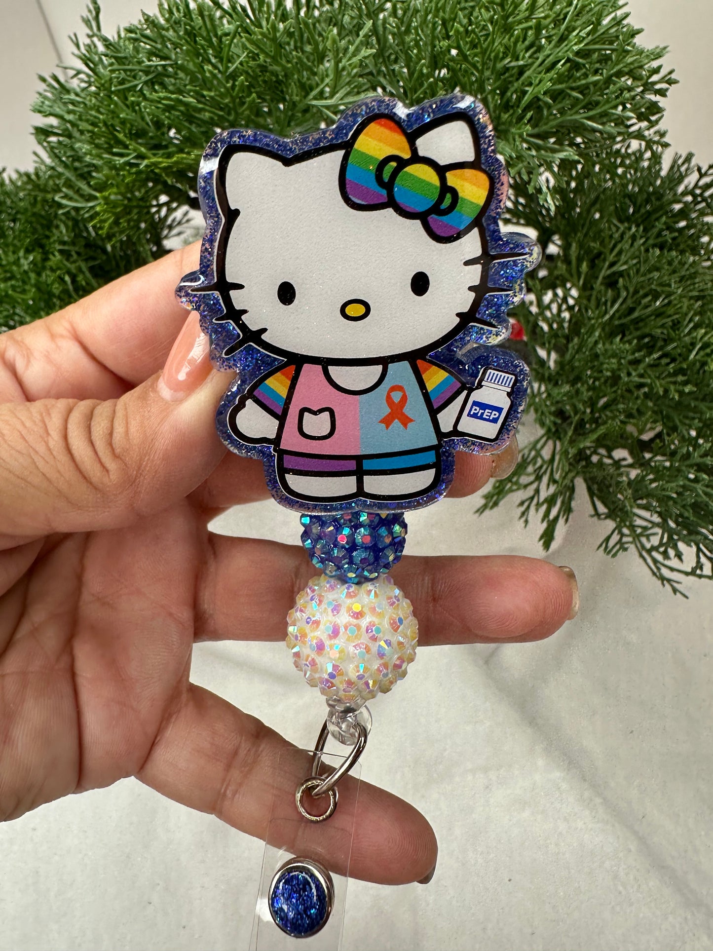 Kitty Aids Awareness Badge Reel