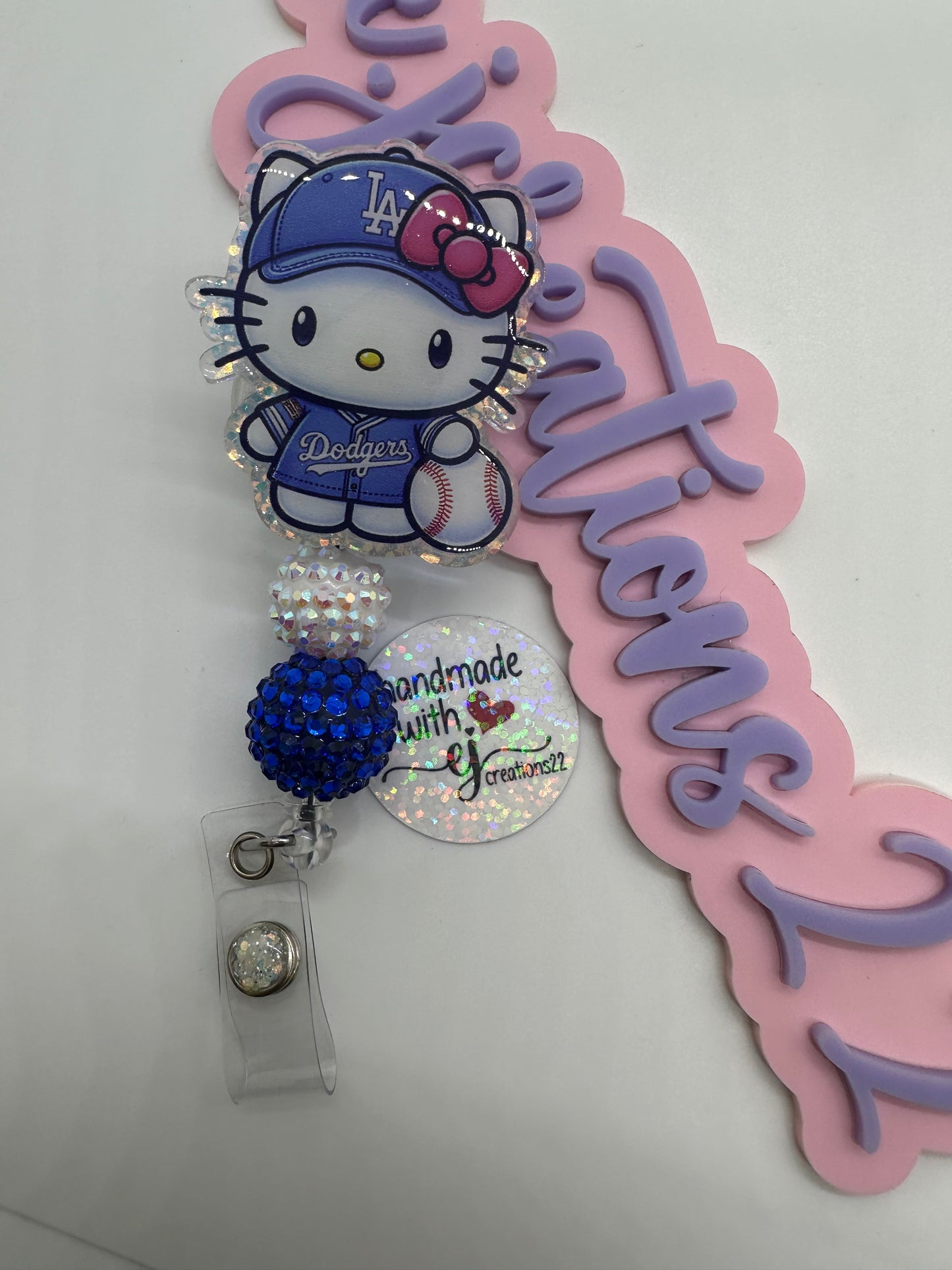 Kitty LA Blue Badge Reel