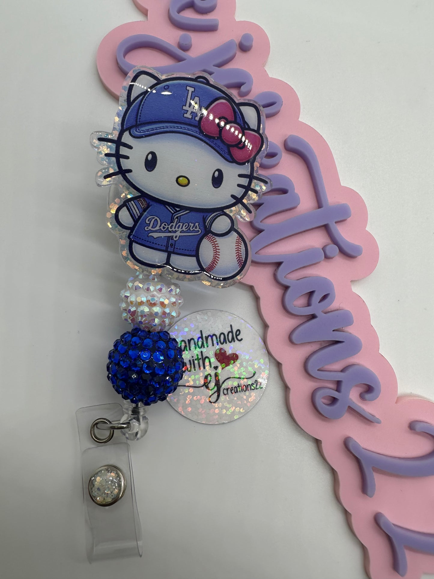 Kitty LA Blue Badge Reel