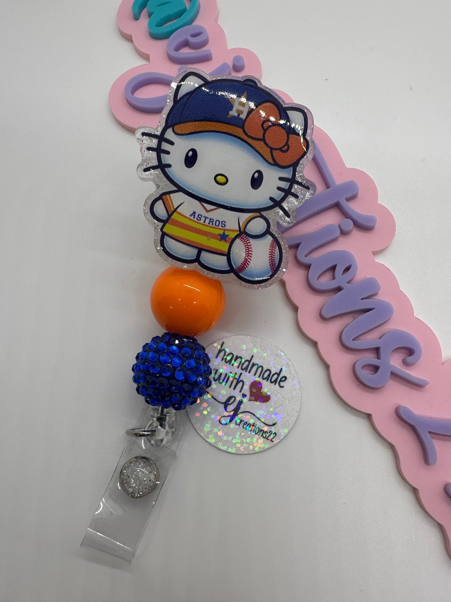 Kitty Orange and White sports Badge Reel